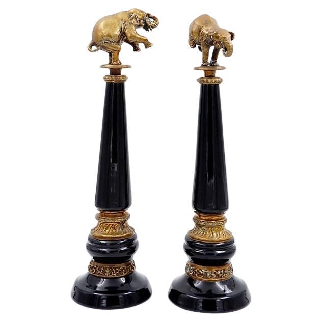 Pair of Bronze elephants on porcelain columns with bronze borders - WONG LEE For Sale