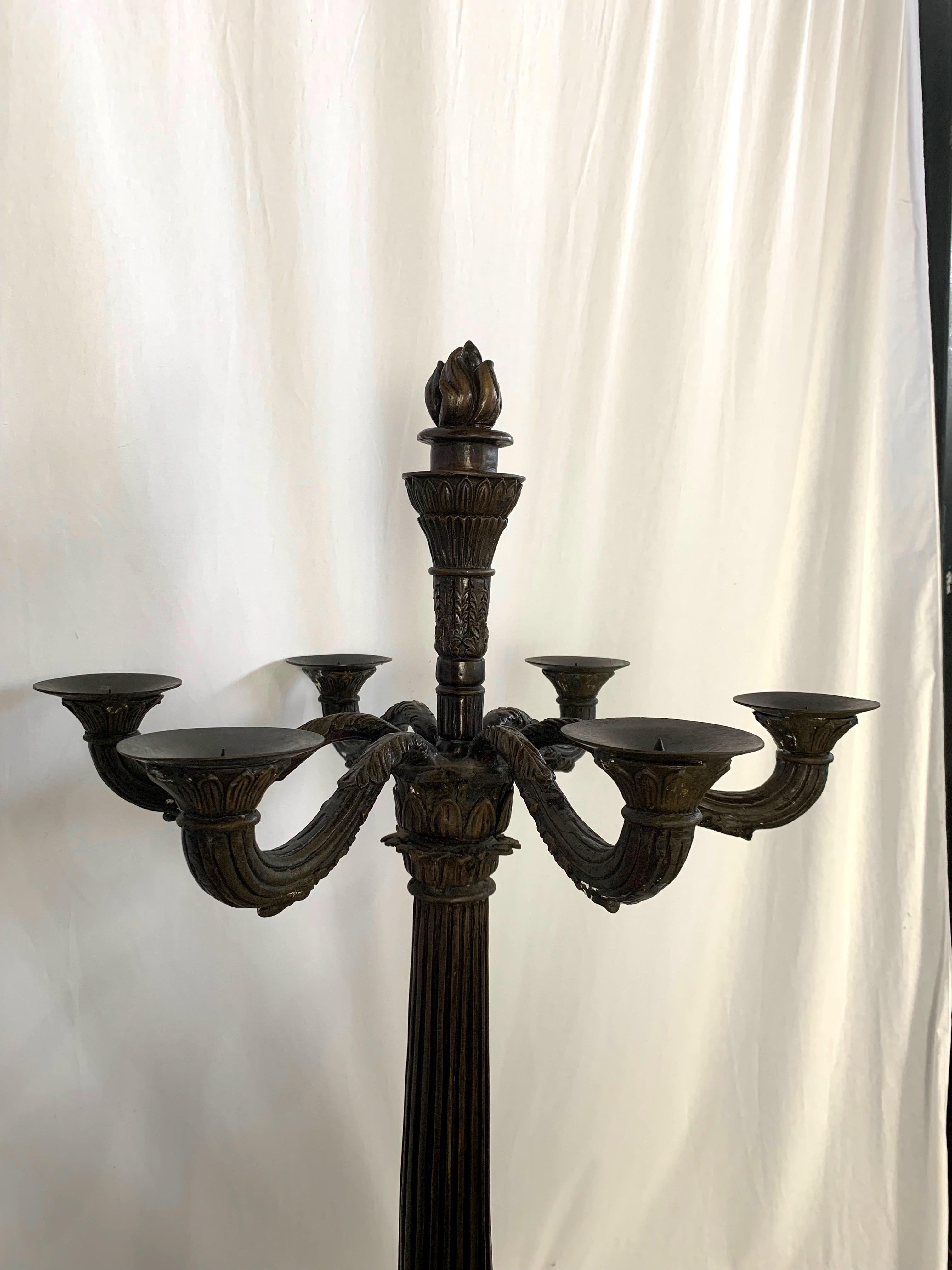 A large pair of Bronze empire Candelabras.