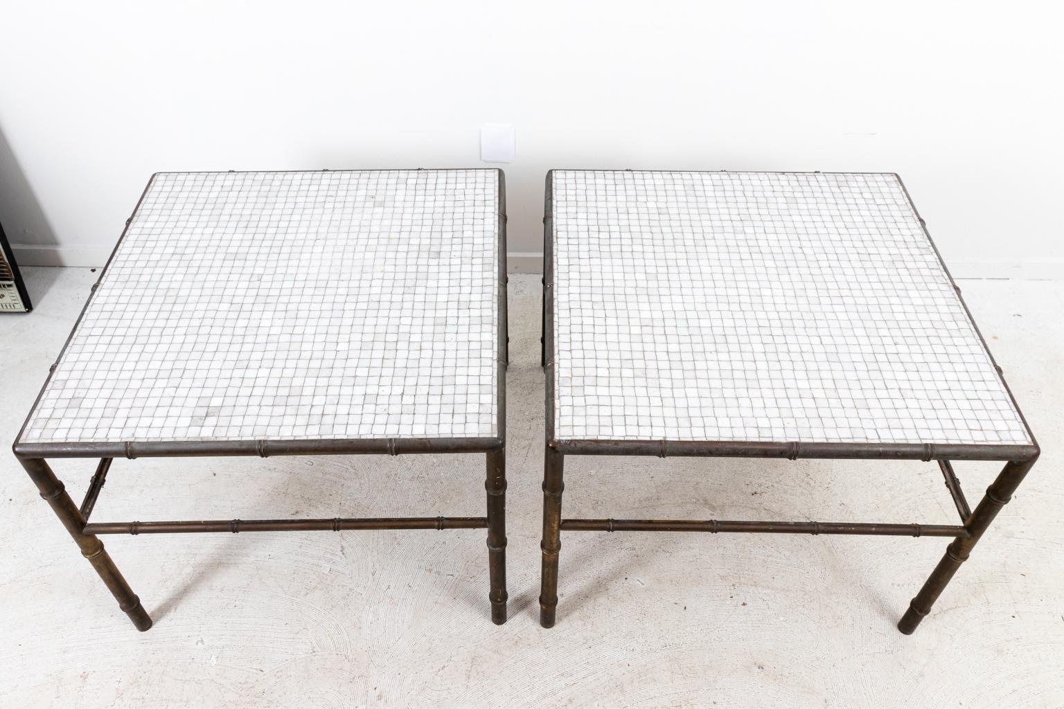 Pair of bronze faux bamboo low tables with glass mosaic tops and space for lower glass shelf, circa mid-20th century. Please note of wear consistent with age including patina and oxidation to the metal frame.