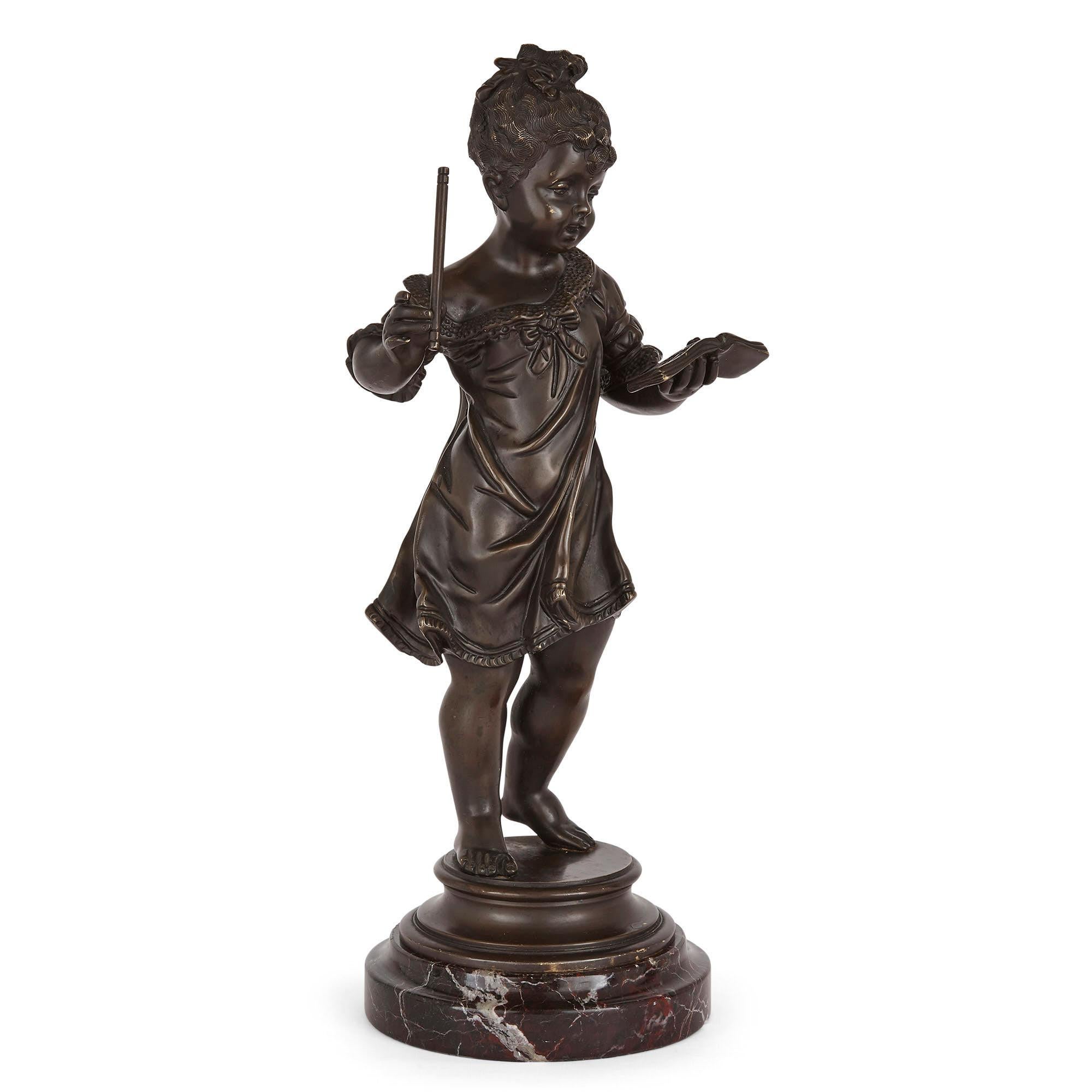 Pair of bronze figures of children playing music by Rousseau
Belgian, early 20th century
Boy with flute: Height 39cm, width 20cm, depth 15cm
Girl with book: Height 40cm, width 17cm, depth 15cm

This pair of patinated bronze sculptures portray a