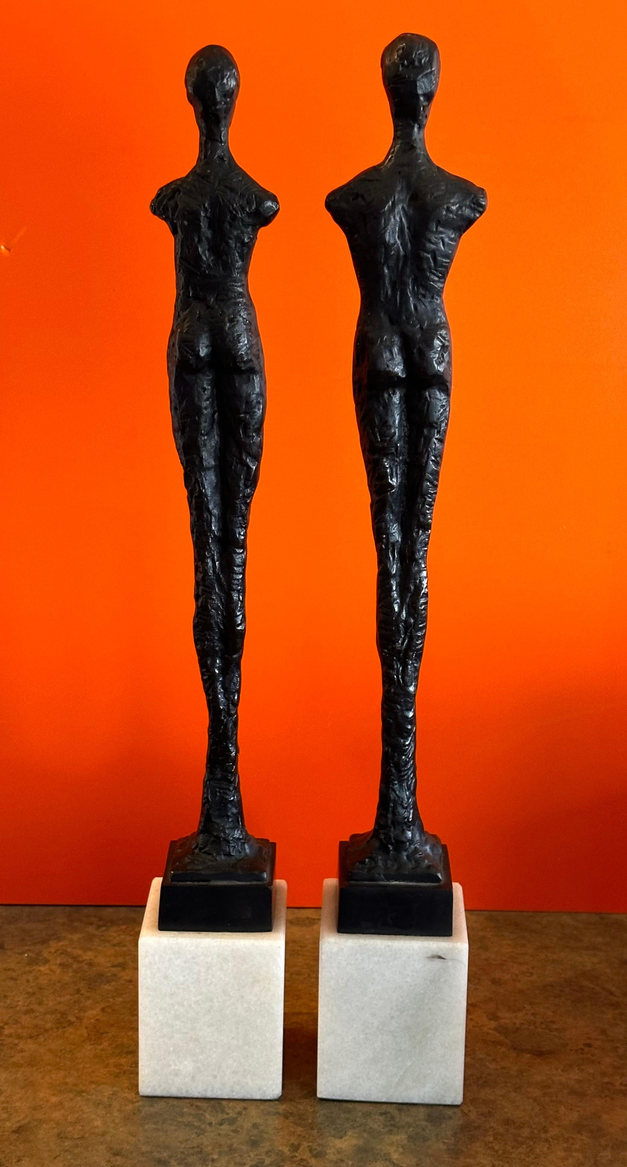 20th Century Pair of Bronze Figurines on Marble in the Style of Alberto Giacometti
