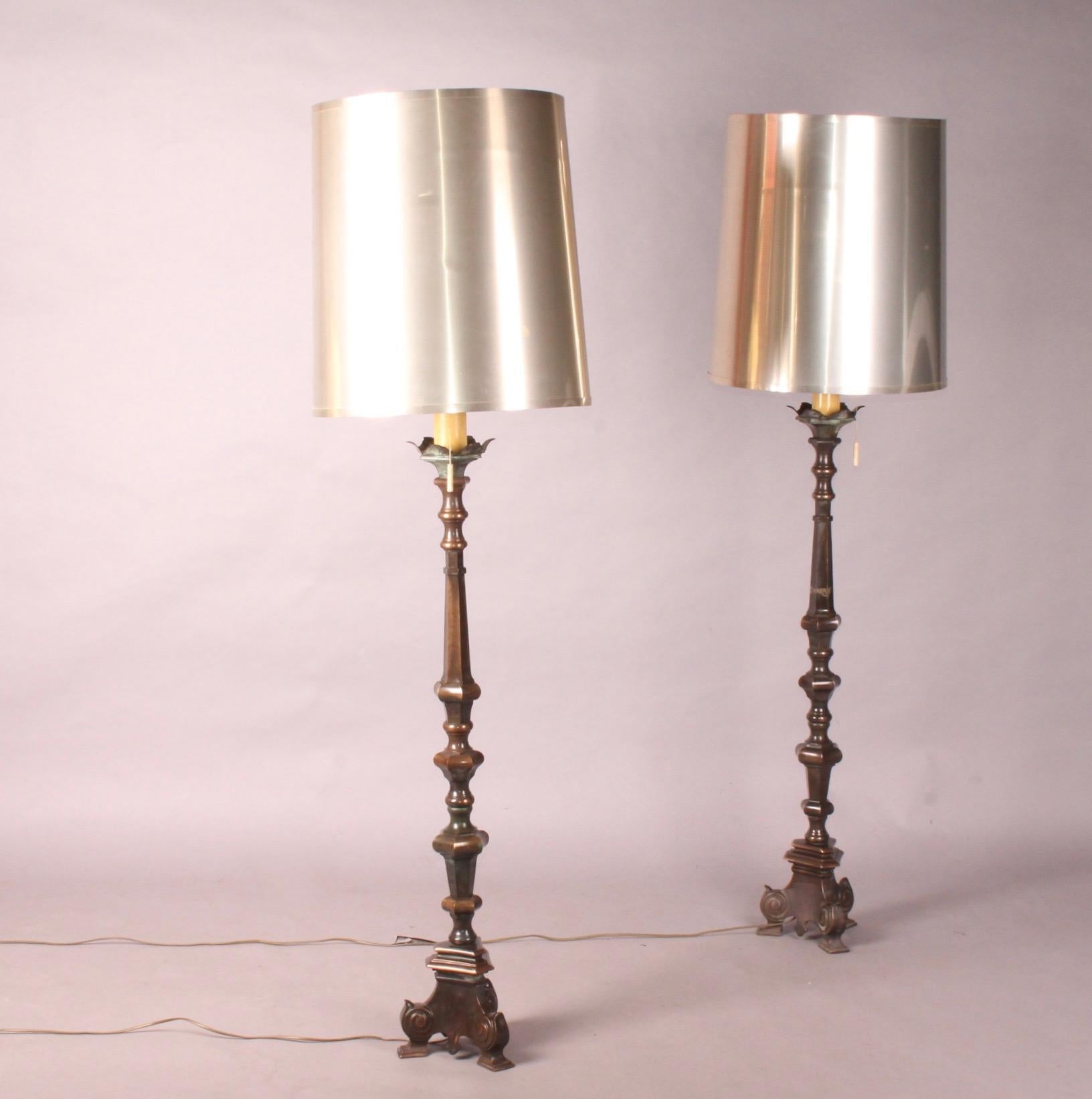 Pair of bronze floor lamp and plastic shade.