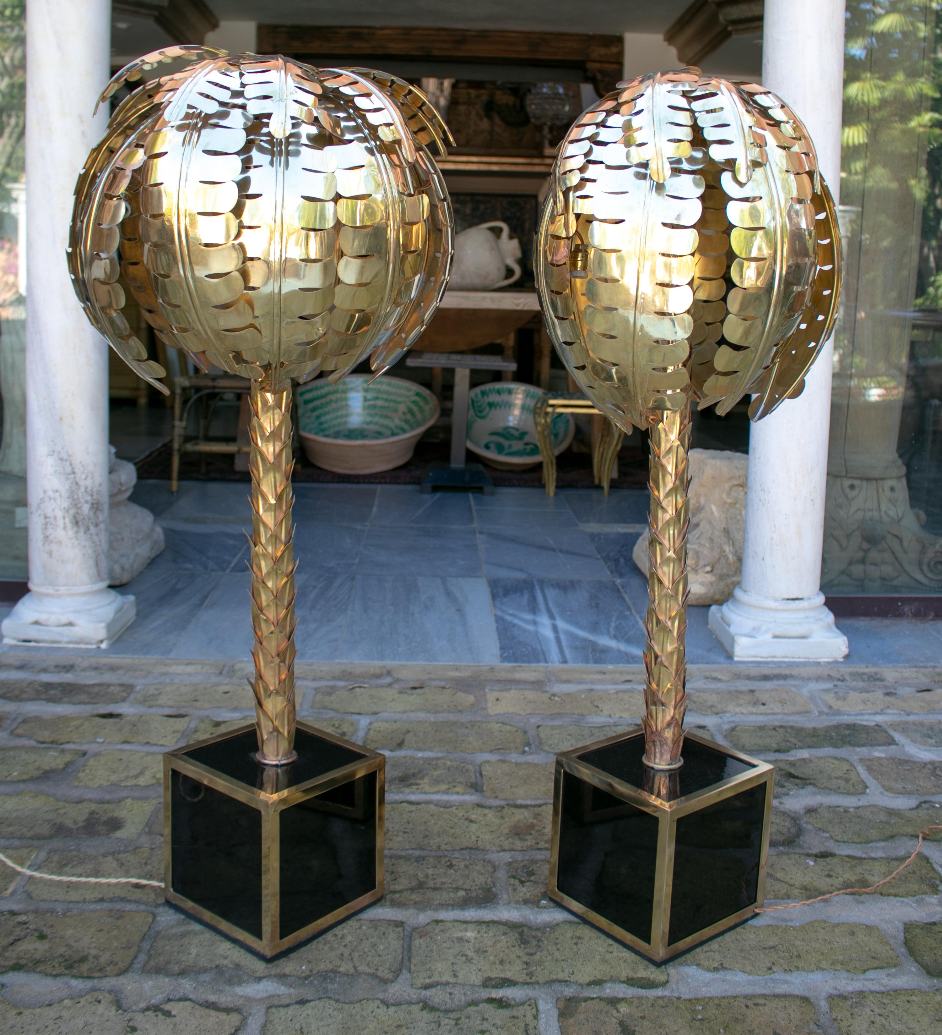 Pair of bronze floor or desk lamps palm tree-shaped and squared base.