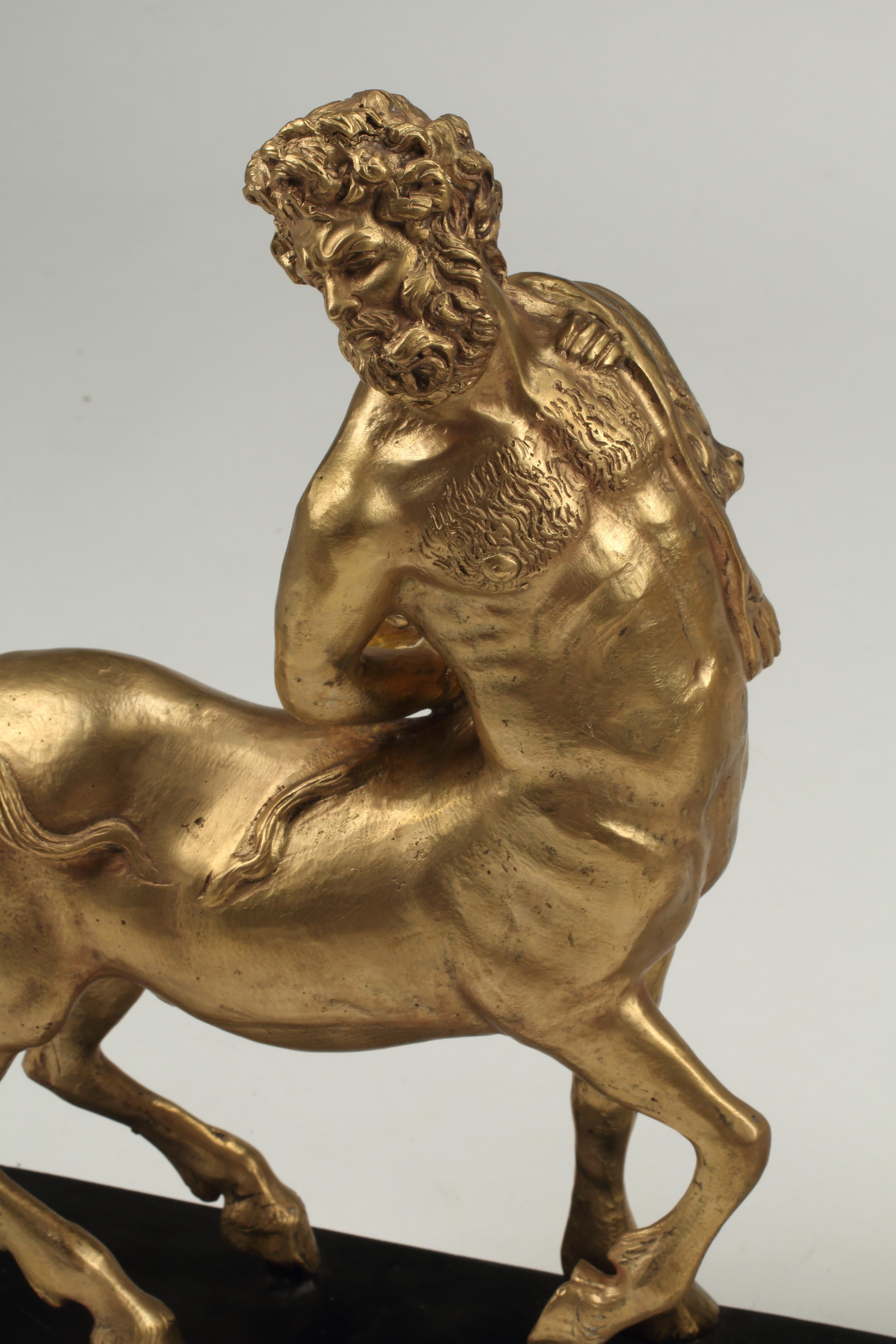 Gilt Pair of Bronze Furietti Centaurs For Sale