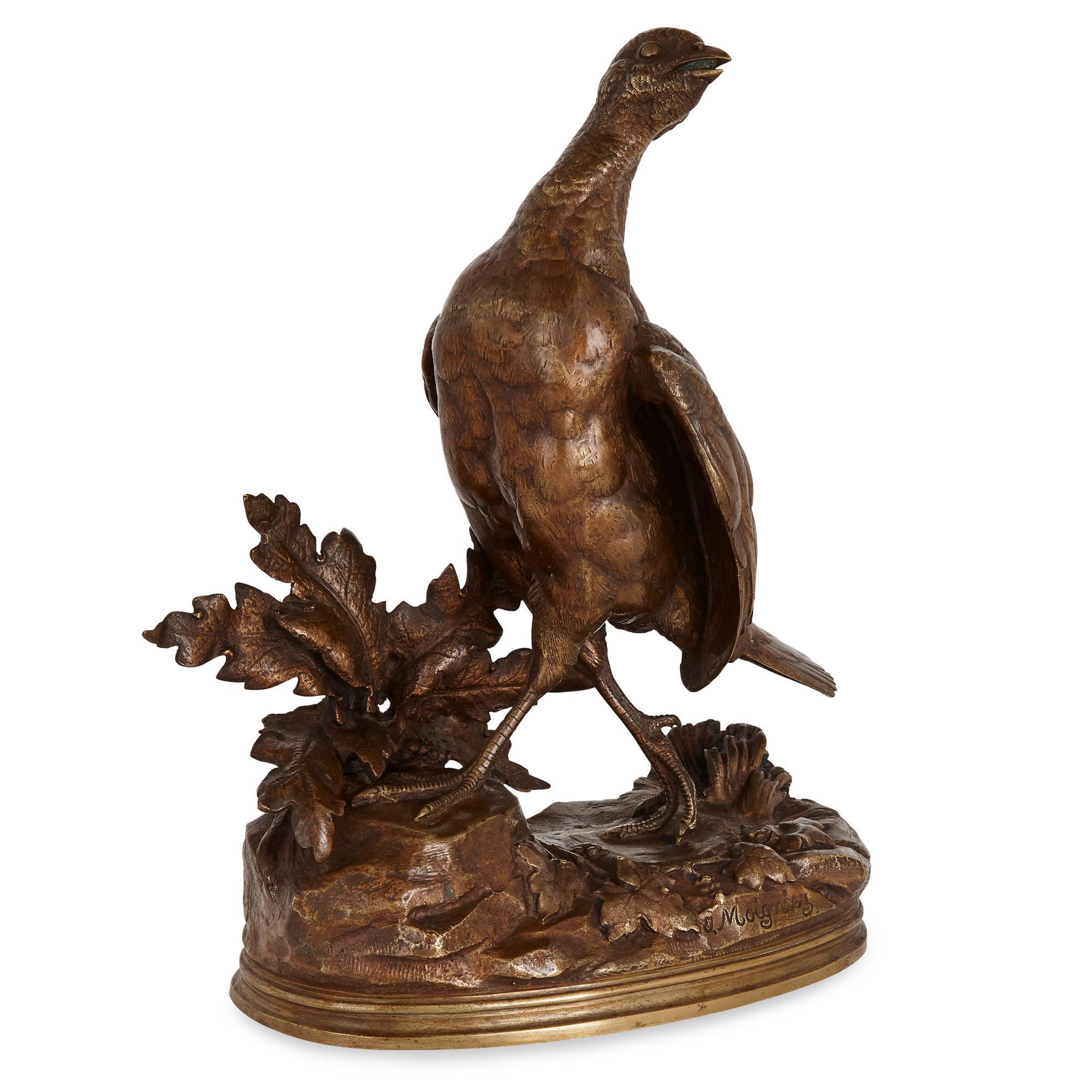 Patiné Paire de sculptures d'oiseaux de chasse en bronze de Jules Moigniez en vente