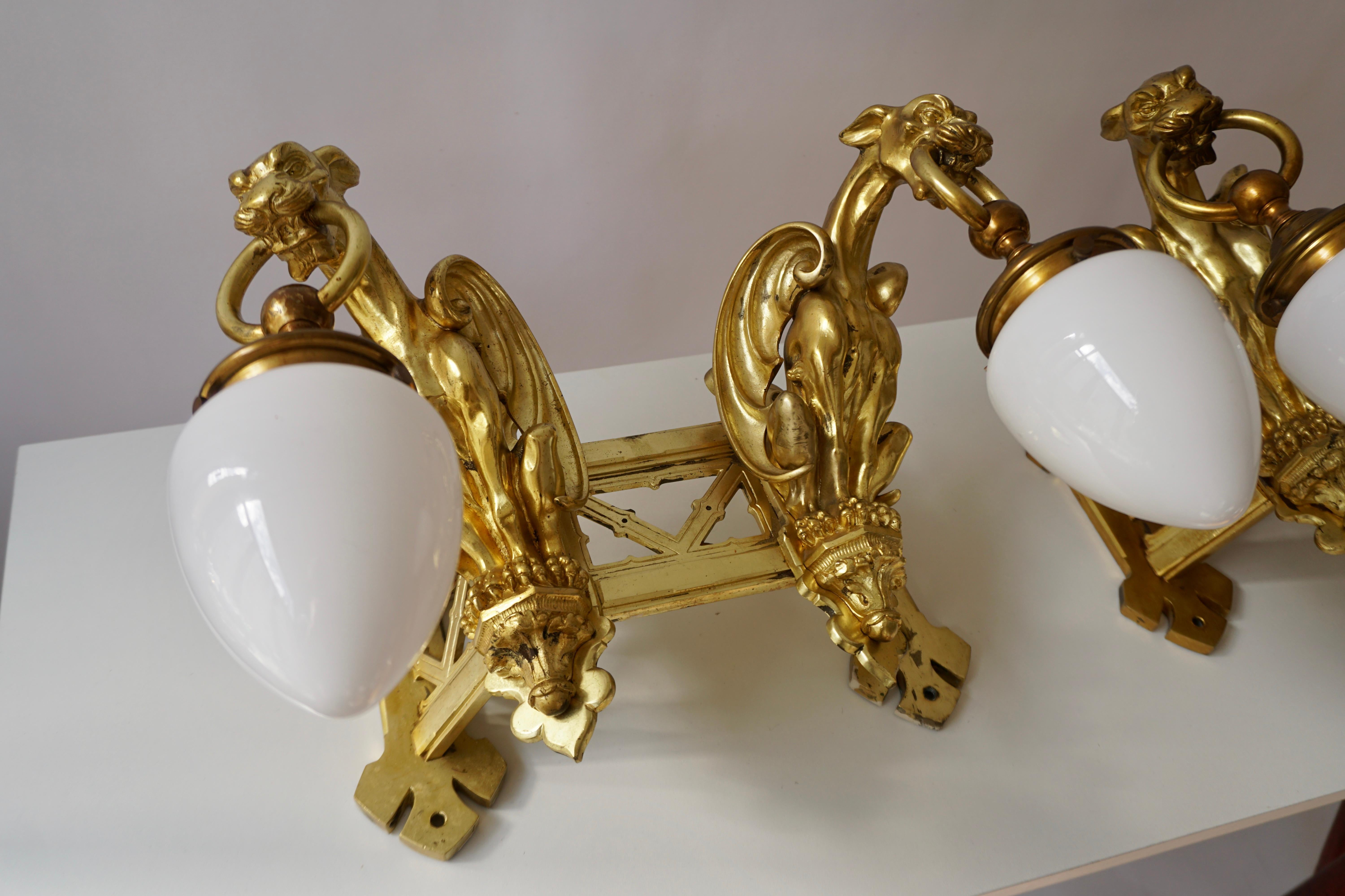 Pair of Bronze Gilt Wall Sconces Representing Two Griffins For Sale 4