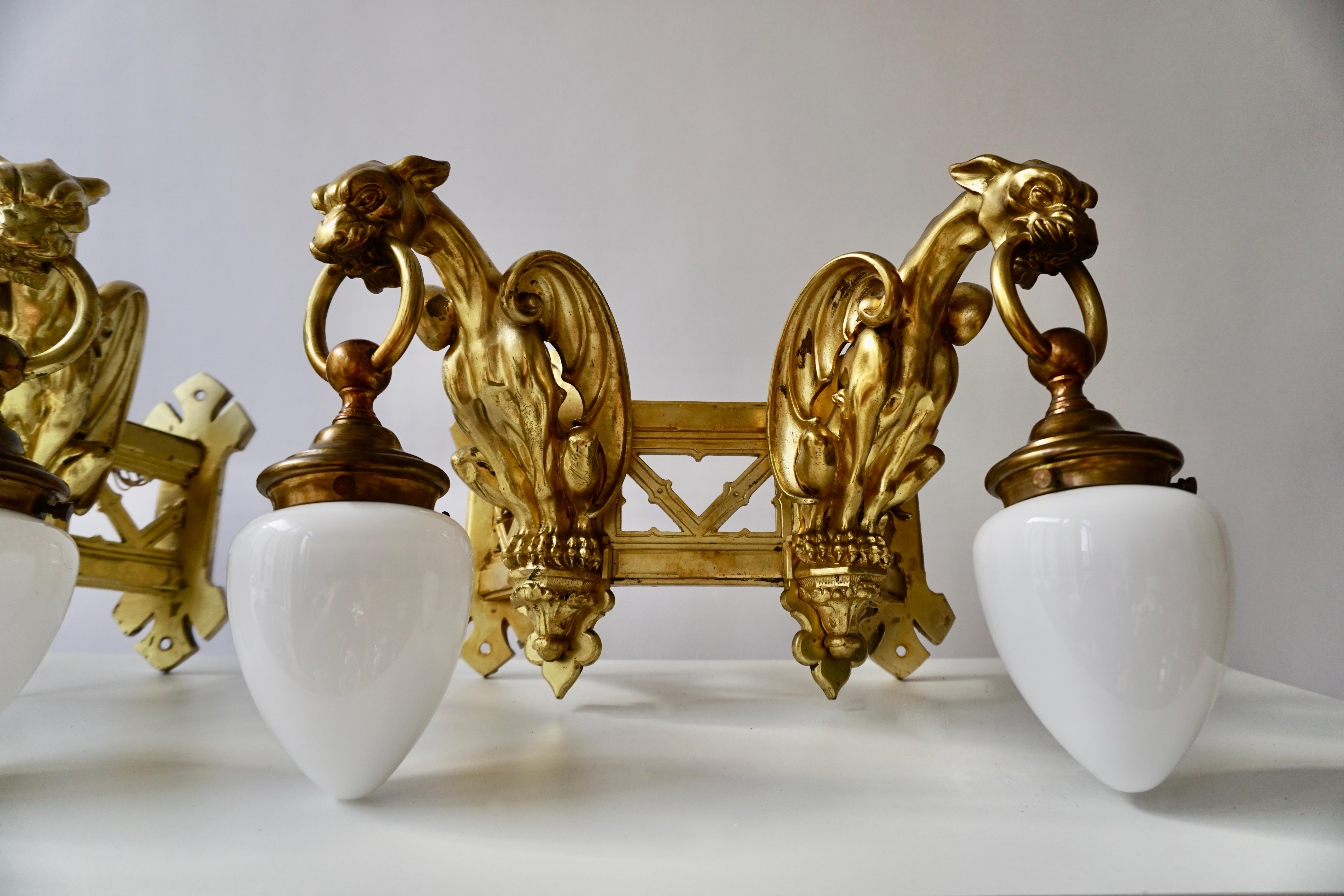 Pair of Bronze Gilt Wall Sconces Representing Two Griffins For Sale 9