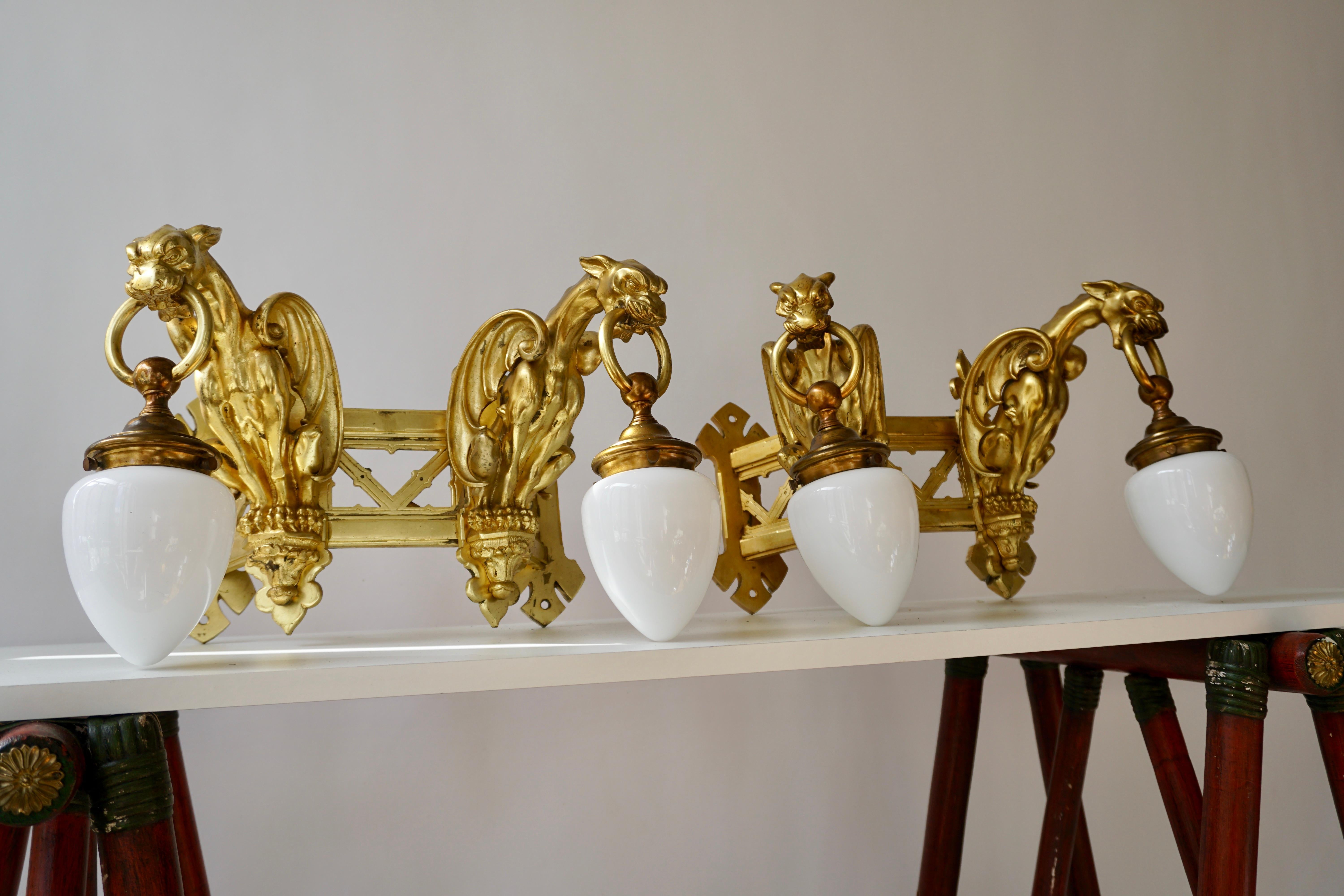Pair of Bronze Gilt Wall Sconces Representing Two Griffins For Sale 11