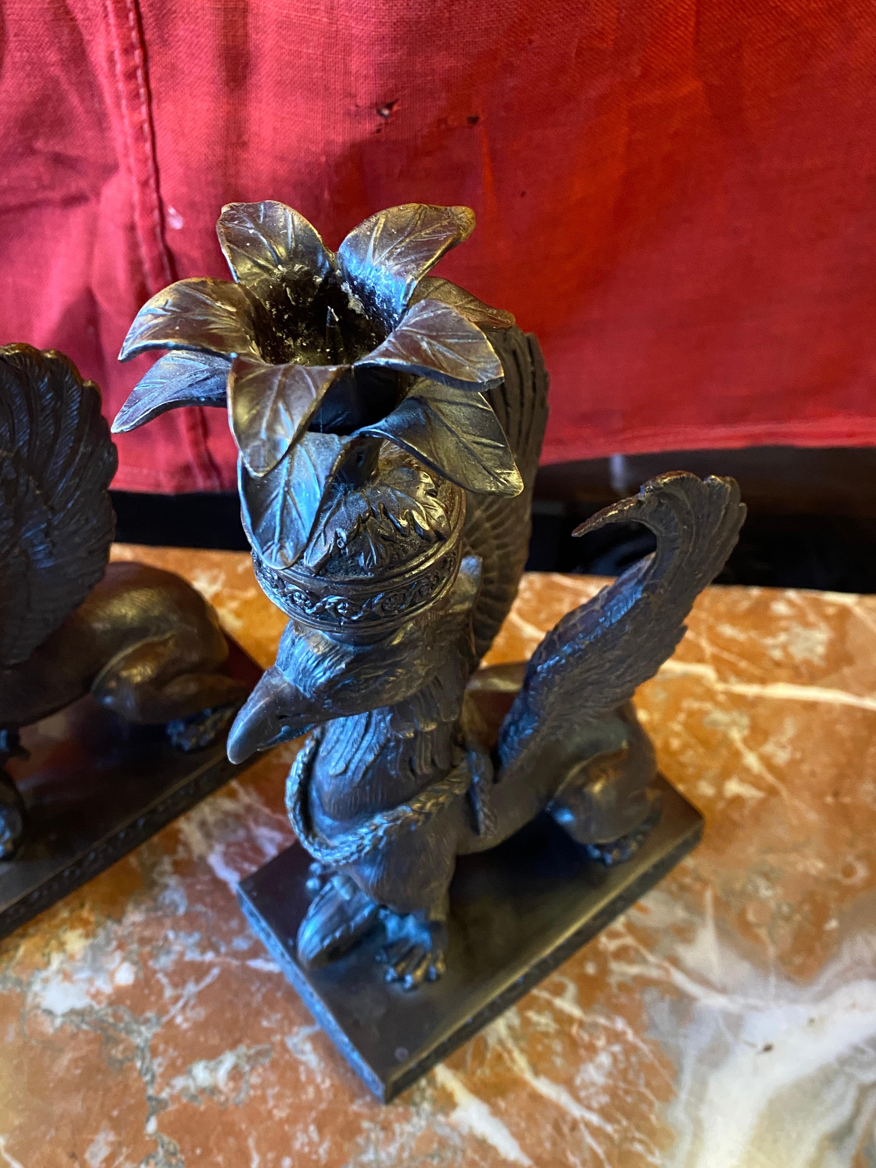 Unknown Pair of Bronze Griffin form Candle Holders