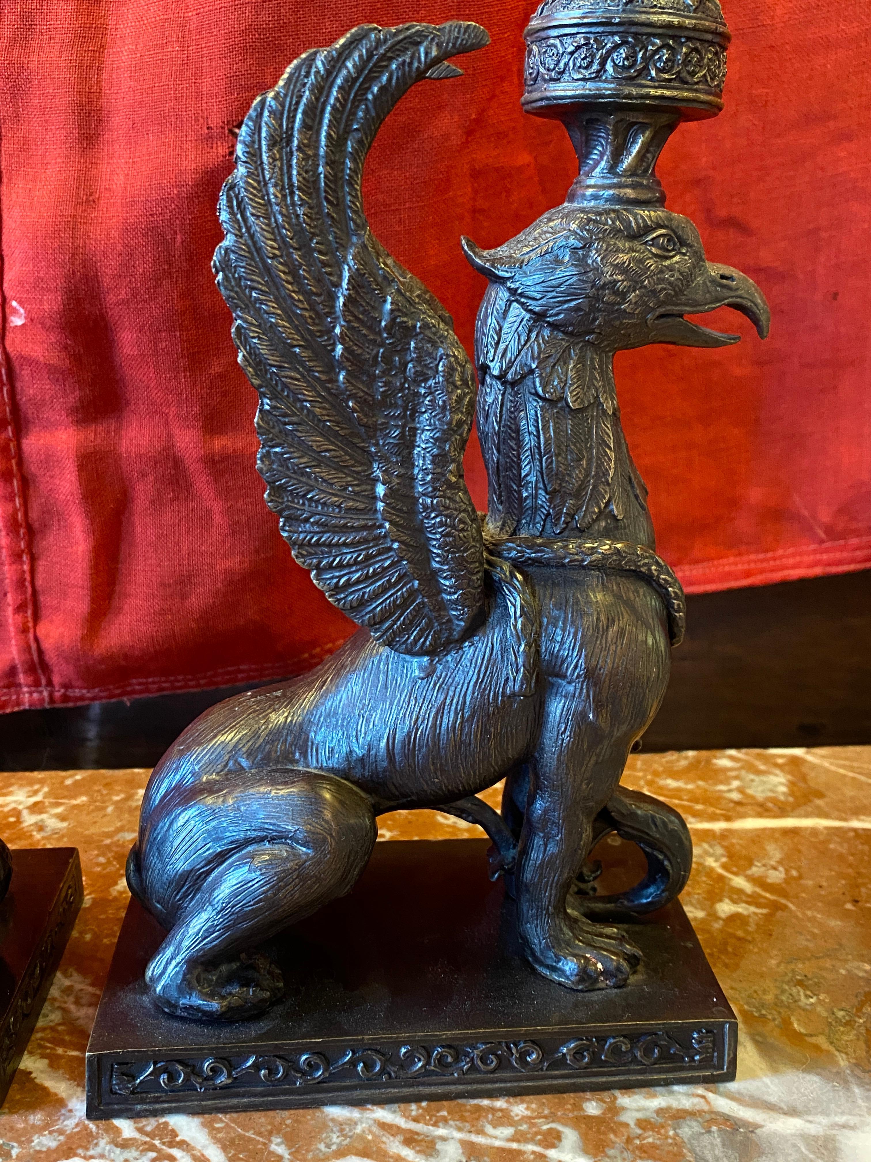 20th Century Pair of Bronze Griffin form Candle Holders