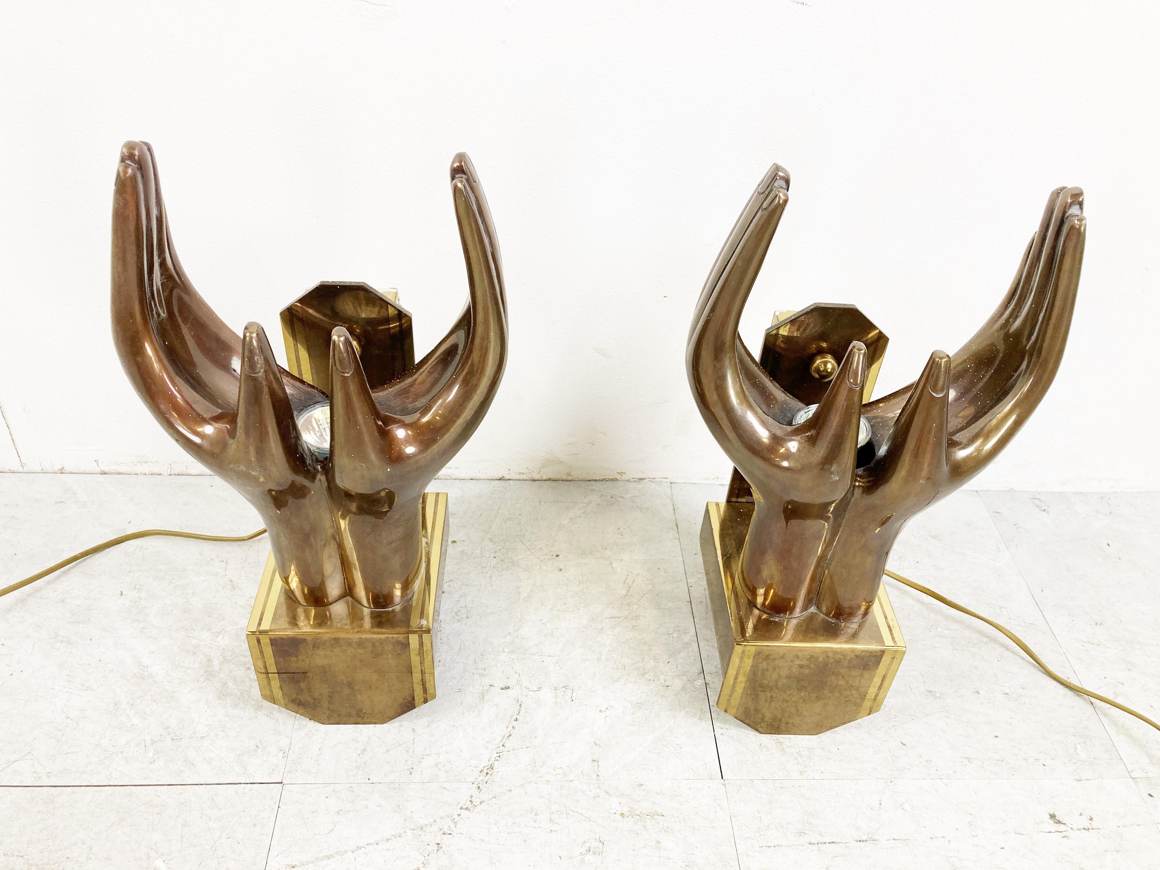 Spectacular pair of double hand solid bronze wall sconces signed by De Gandt '91.

Beautiful timeless look and real statement pieces. 

1990s - Belgium

Good condition, tested and ready to use with GU10 spot lamps

Work with GU 10 spots