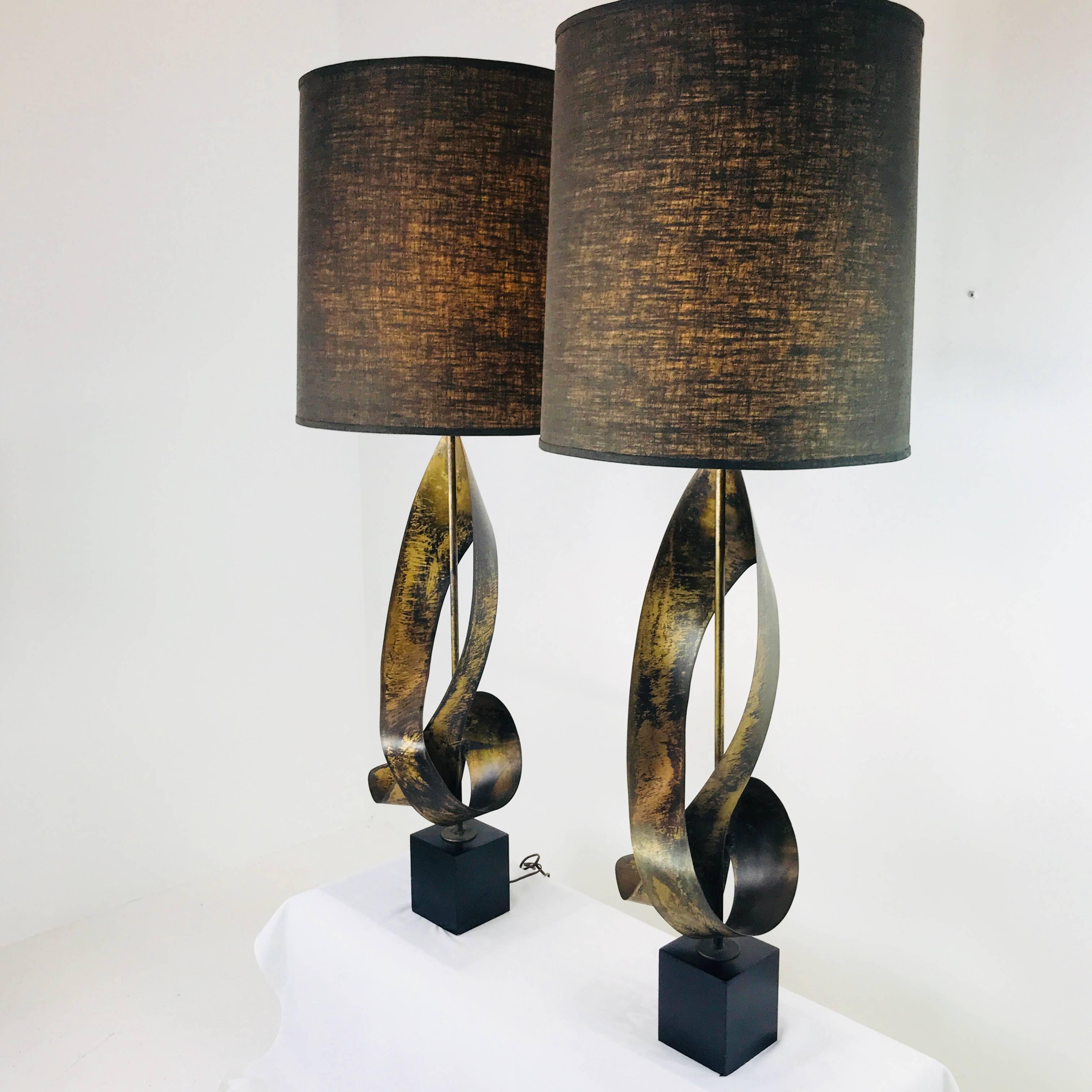 Pair of bronze sculptural Laurel lamps. In good vintage condition with wear due to age and use. Original wiring, circa 1960s.

Dimensions:
12