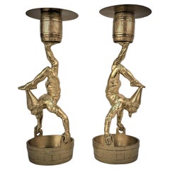 Pair of Bronze Juggler Candlestick