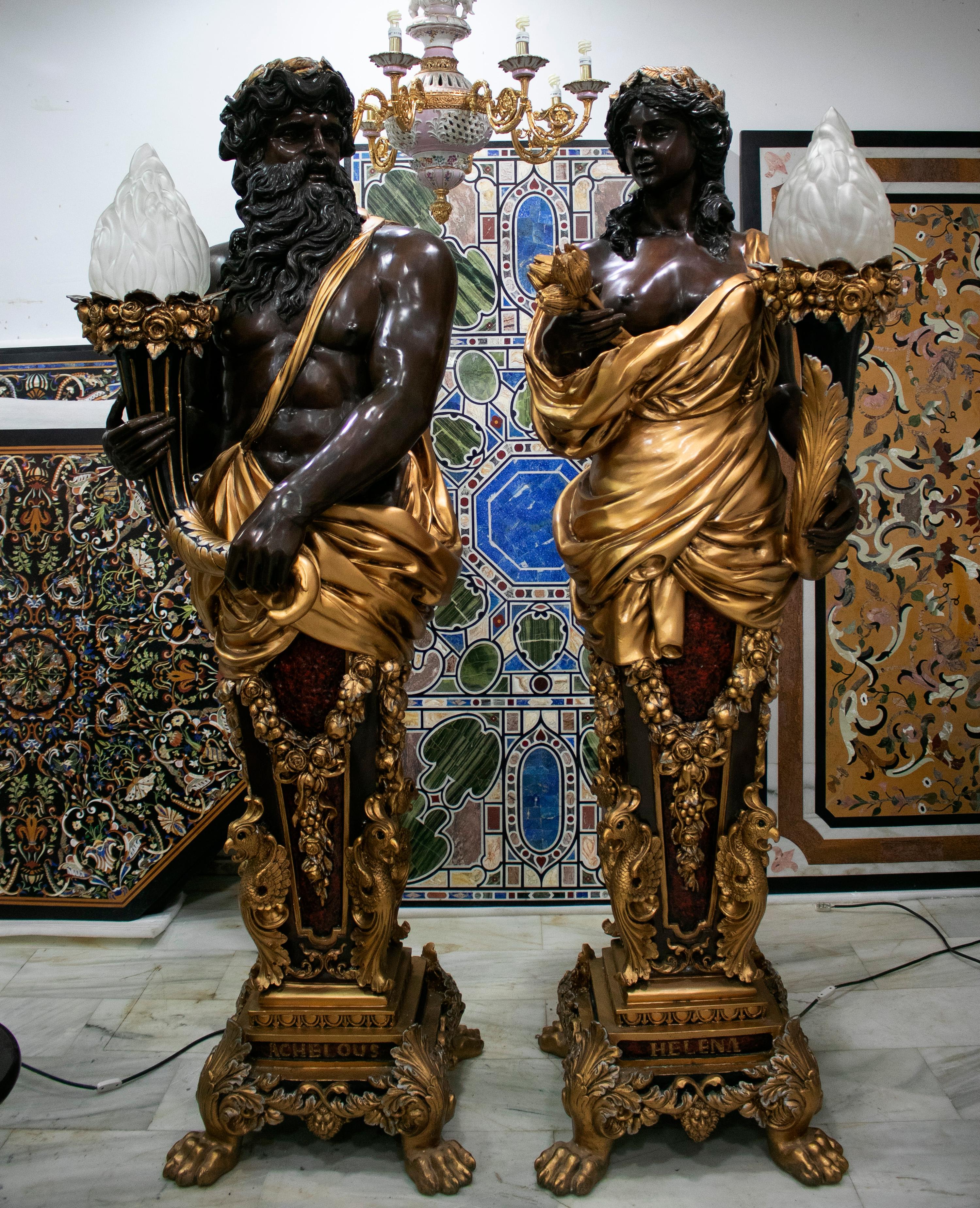 Pair of large tall lampers representing Zeus and his wife Hera, cast in bronze, hand painted and varnished. 


