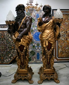 Pair of Bronze Lampers Representing Zeus and His Wife Hera
