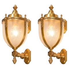 Pair of bronze lanterns with brackets