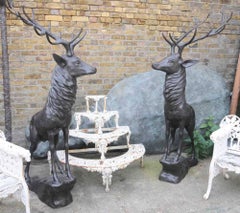 Pair of Bronze Life 20th Century Size Stags on Rocks in a Majestic Pose