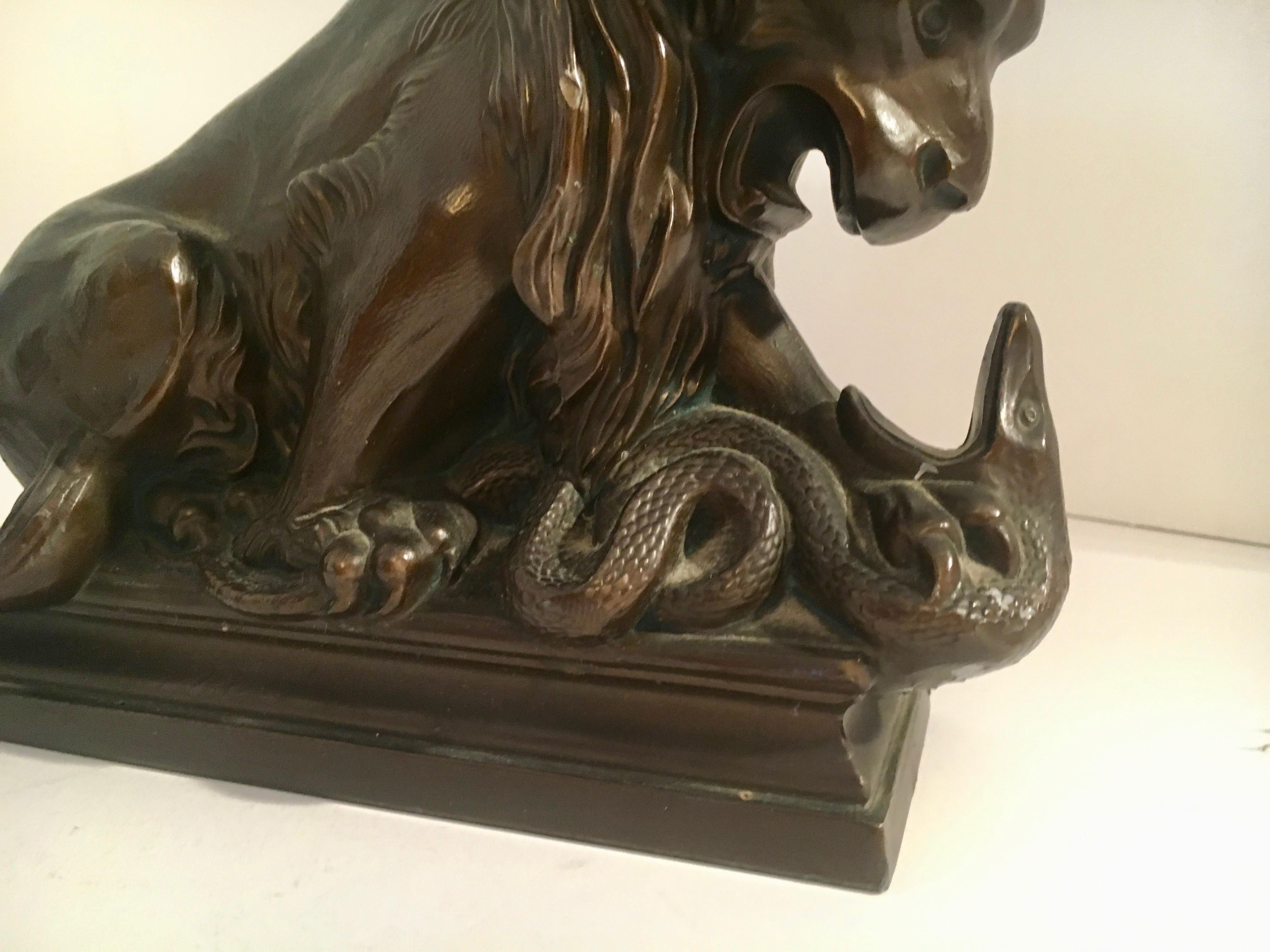 Pair of Bronze Lion Wrestling with Serpent Bookends In Good Condition In Los Angeles, CA