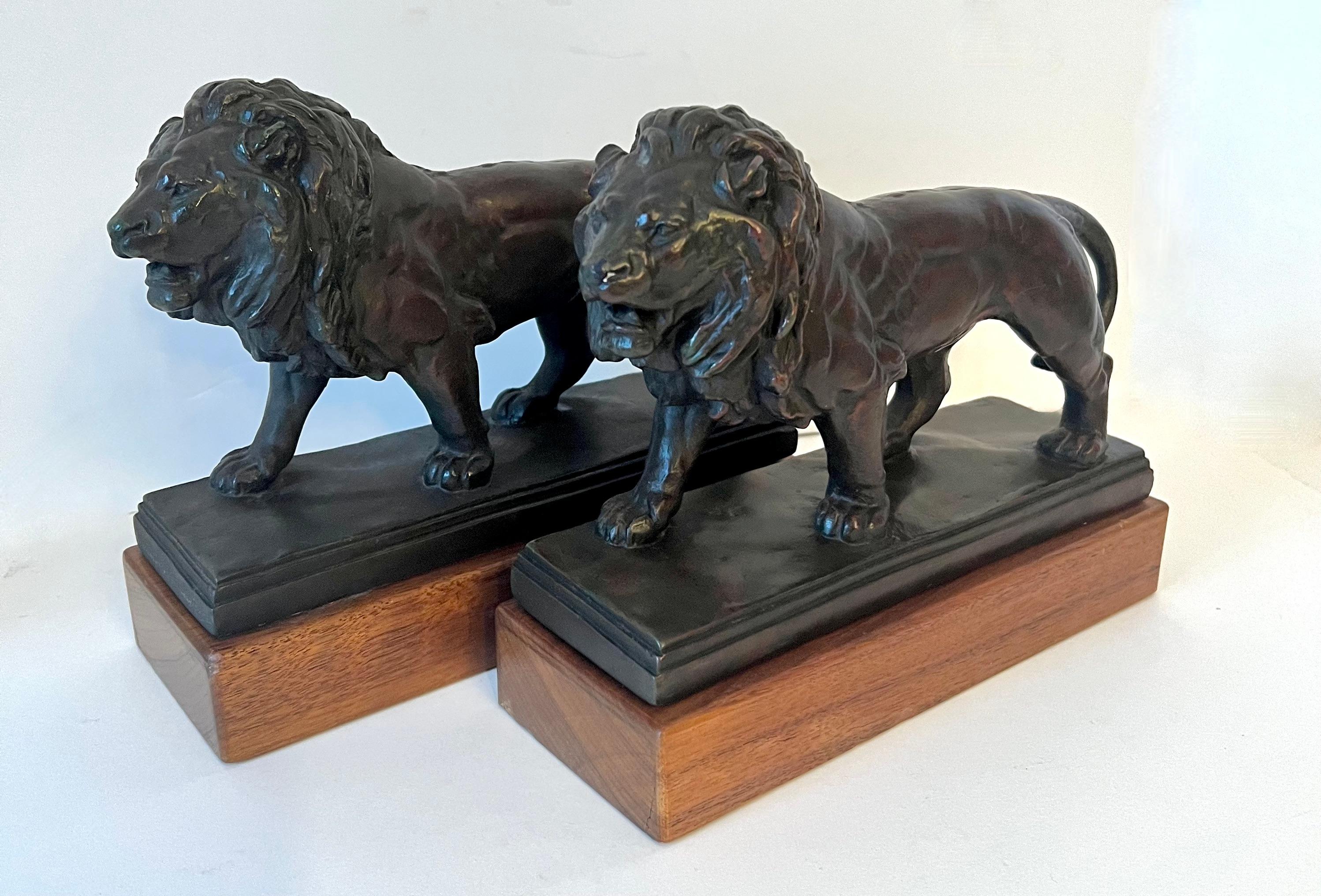 Patinated Pair of Bronze Lions on Wood Base