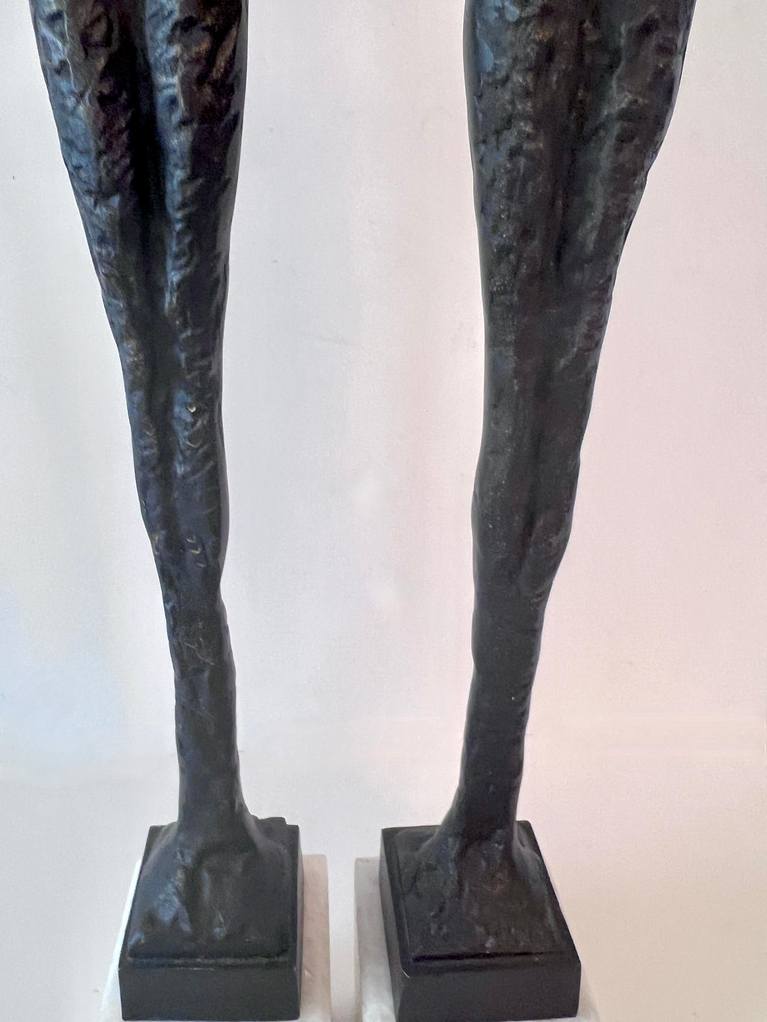 Pair of Bronze Male and Female Bronze Sculptures in the Style of Giacometti  In Good Condition In Los Angeles, CA