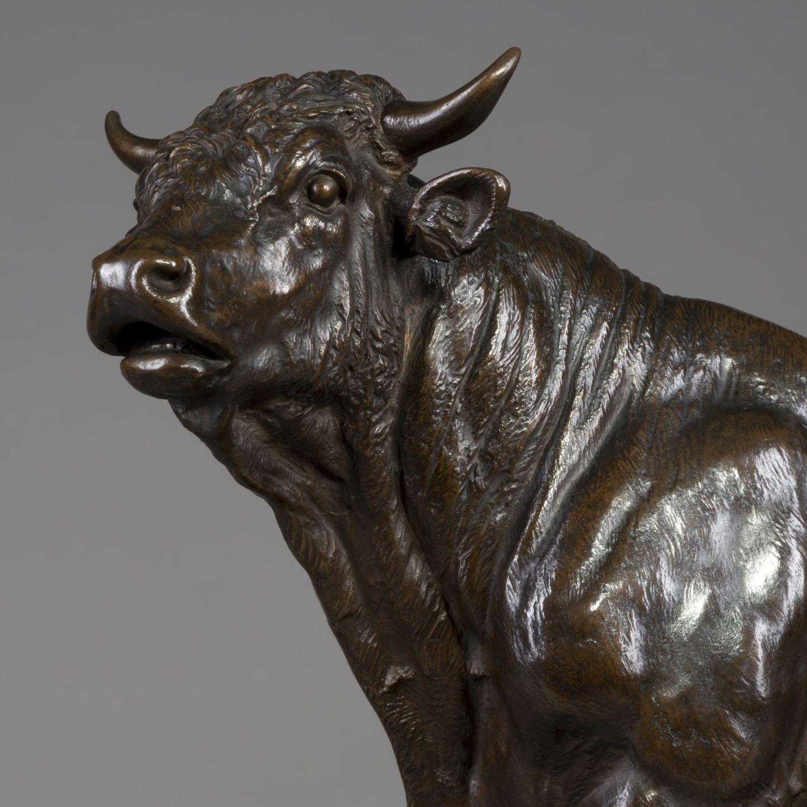 Patinated Pair of Bronze Models of a Standing Bull and a Running Cow, circa 1890 For Sale