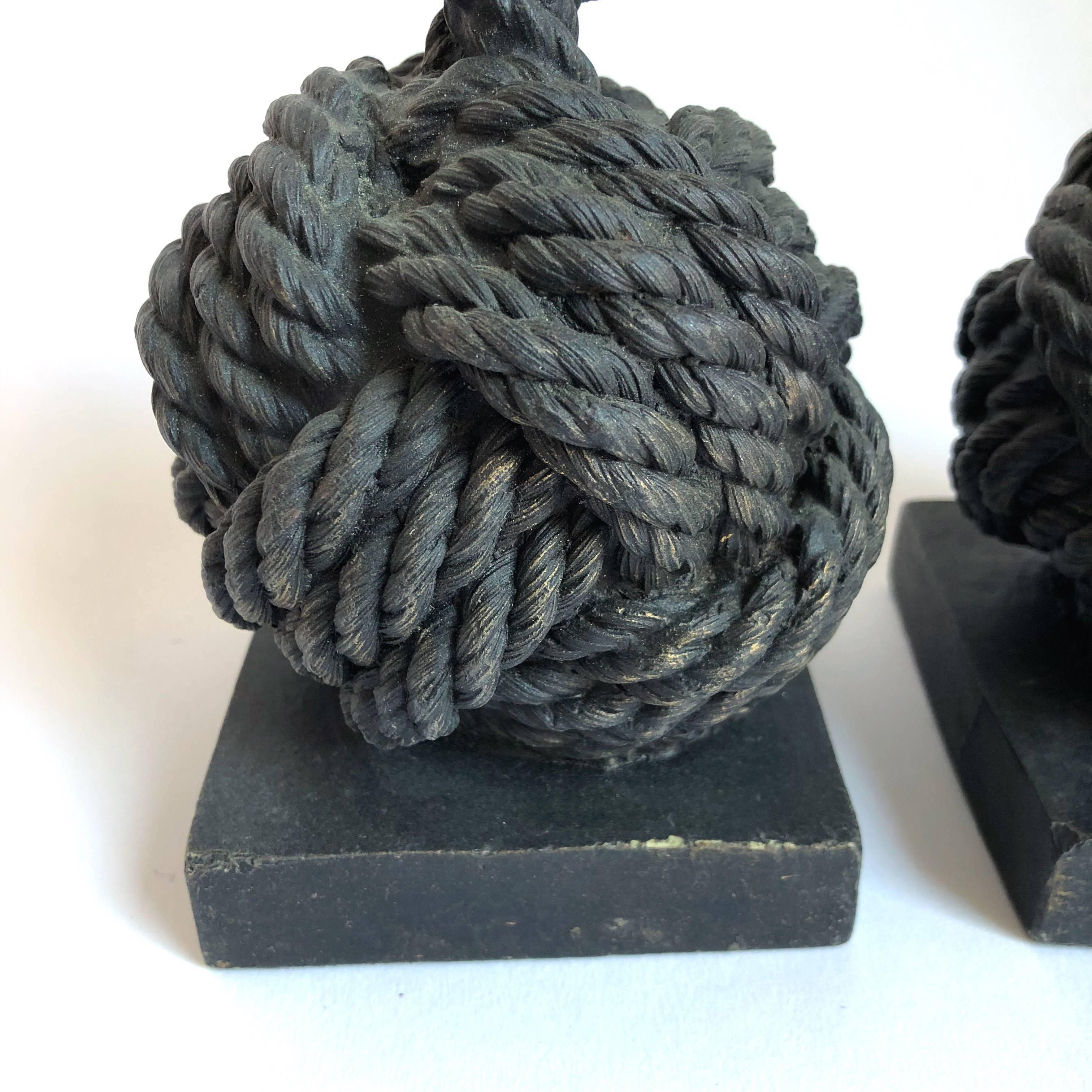 Pair of bronze monkey fist knot bookends.
 