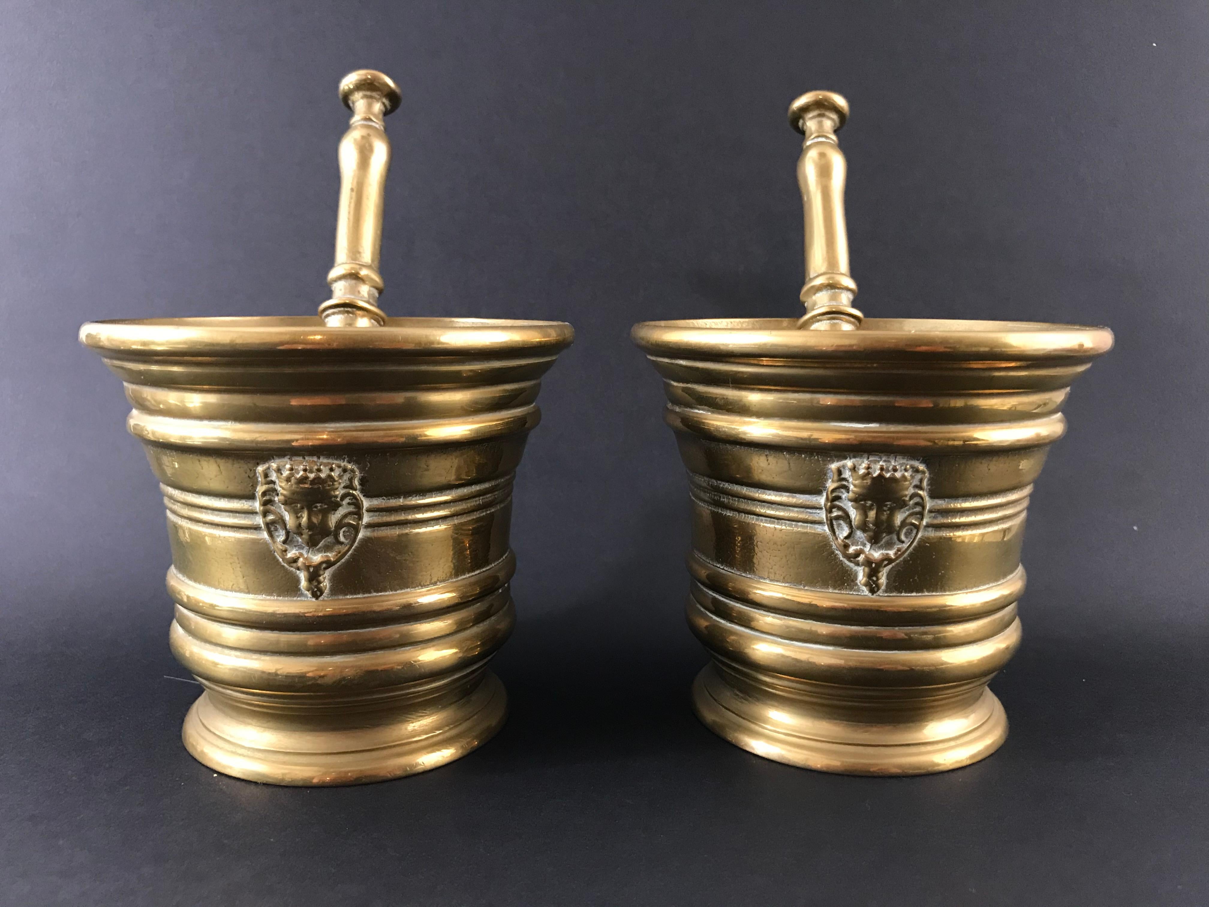 Pair of bronze mortar decorated with a mascaron and their pestle, early 20th century.
Measures: Height mortar 4 inches
Height pestle 7 inches.
  