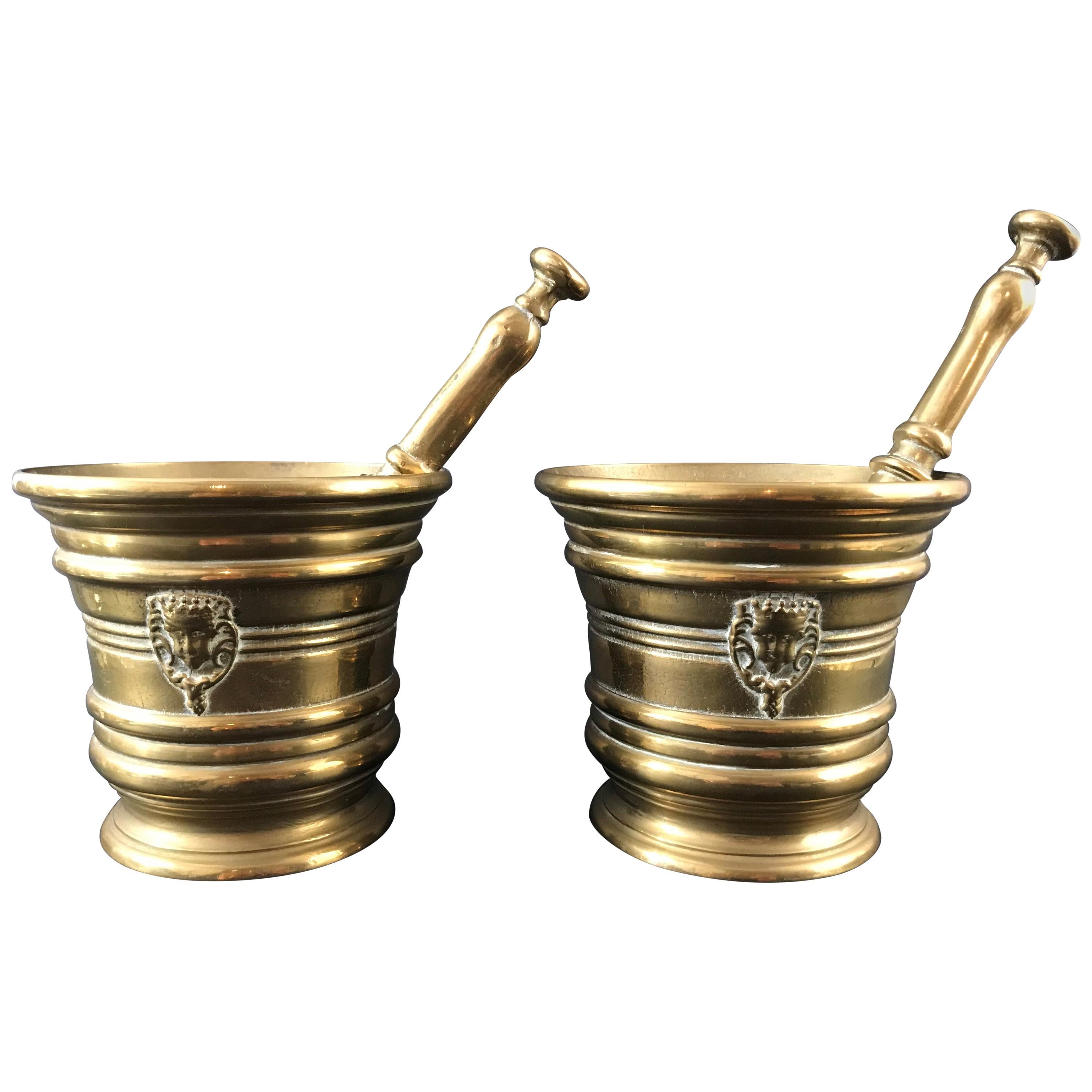 Pair of Bronze Mortar with Mascarons For Sale