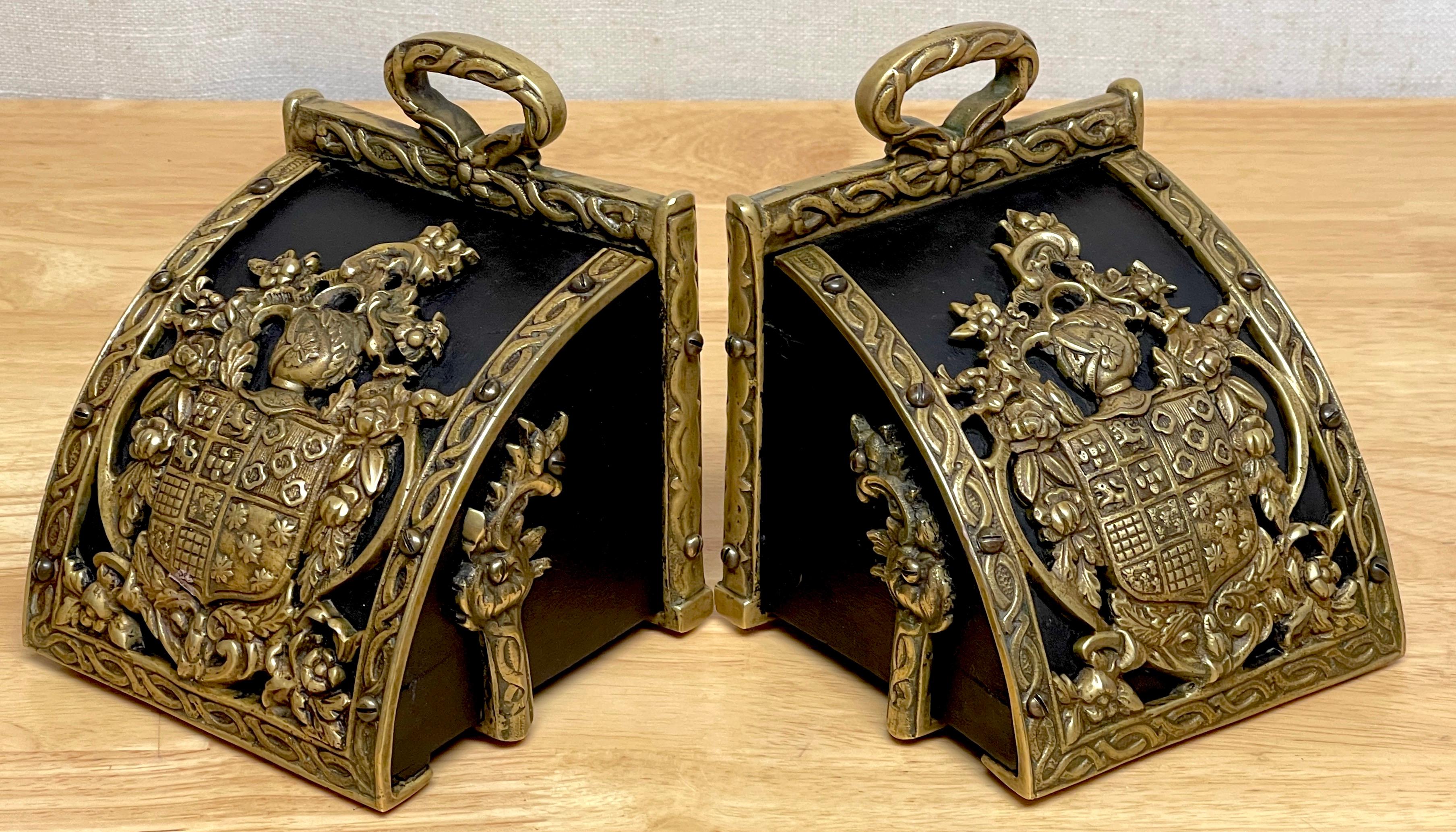 Pair of Bronze Mounted Armorial Motif Ebonized Wood Stirrup Motif Bookends 9