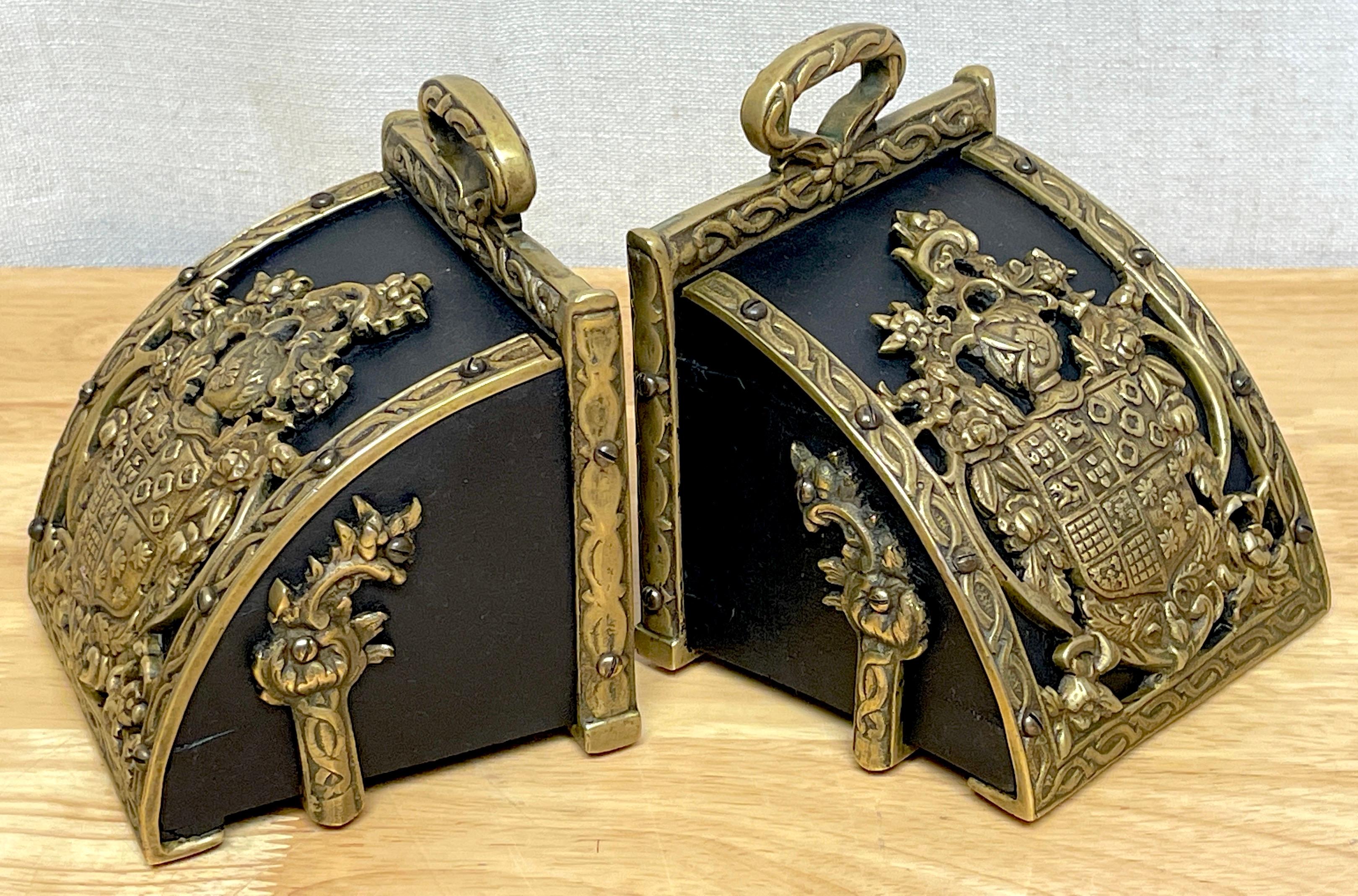 Portuguese Pair of Bronze Mounted Armorial Motif Ebonized Wood Stirrup Motif Bookends  For Sale