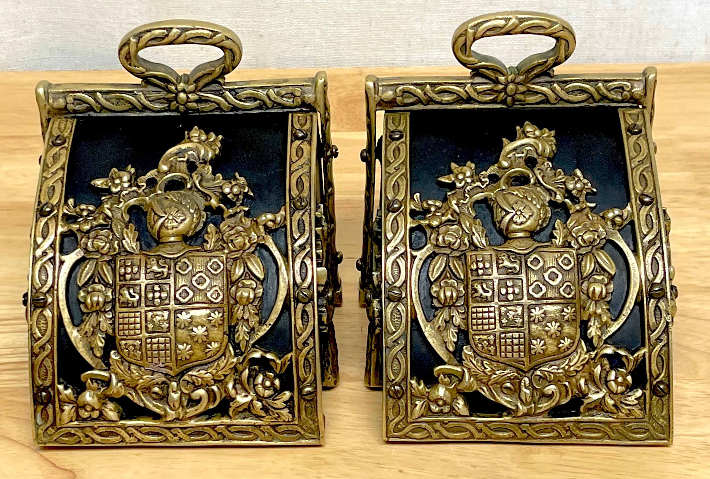 Pair of Bronze Mounted Armorial Motif Ebonized Wood Stirrup Motif Bookends  In Good Condition For Sale In West Palm Beach, FL