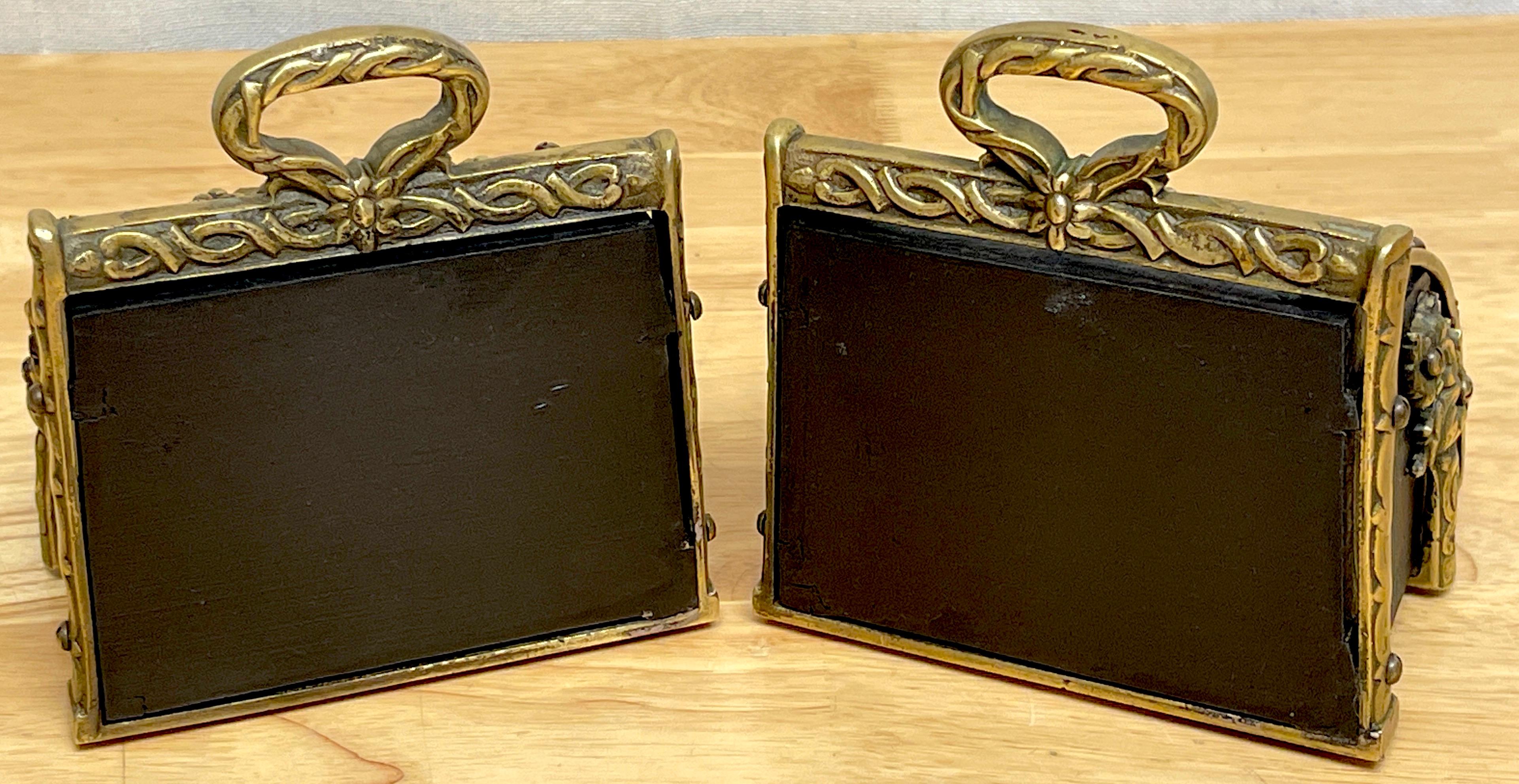 Pair of Bronze Mounted Armorial Motif Ebonized Wood Stirrup Motif Bookends  For Sale 2