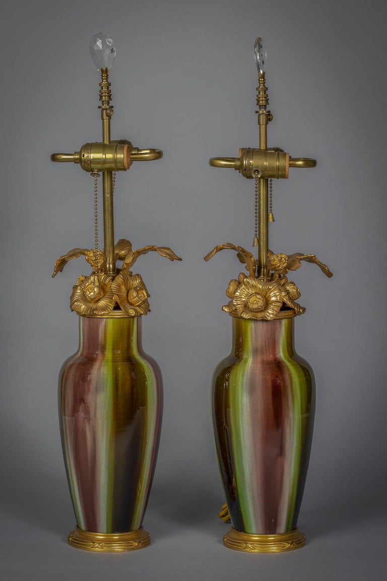 Floral bronze mounts and drip glazed porcelain.
