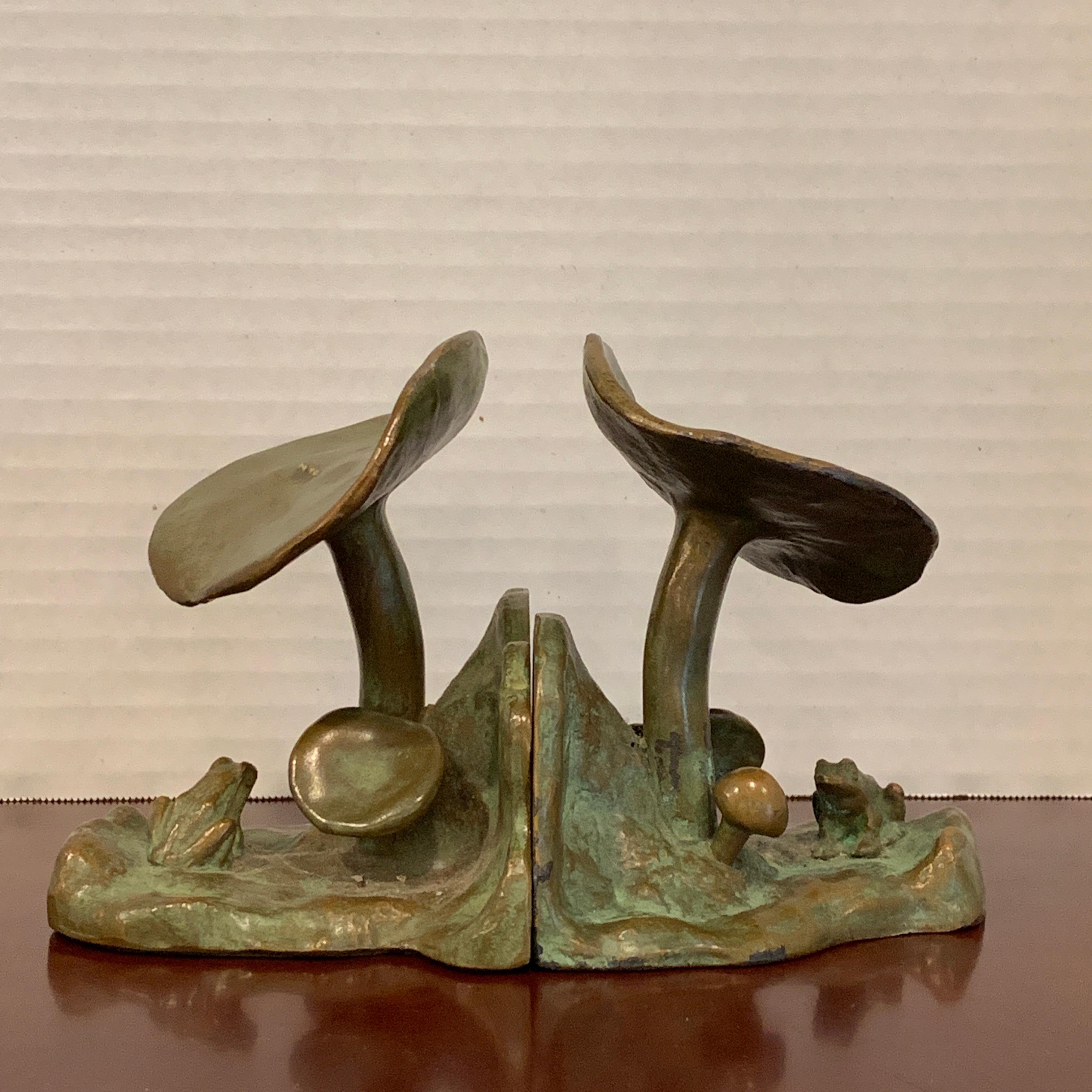 Pair of bronze mushroom and frog motif bookends by McClelland Barclay
McClelland Barclay (1891-1943), American sculptor
In two parts, each one beautifully cast of a landscape with mushrooms and a seated frog, inscribed signature on back
Each
