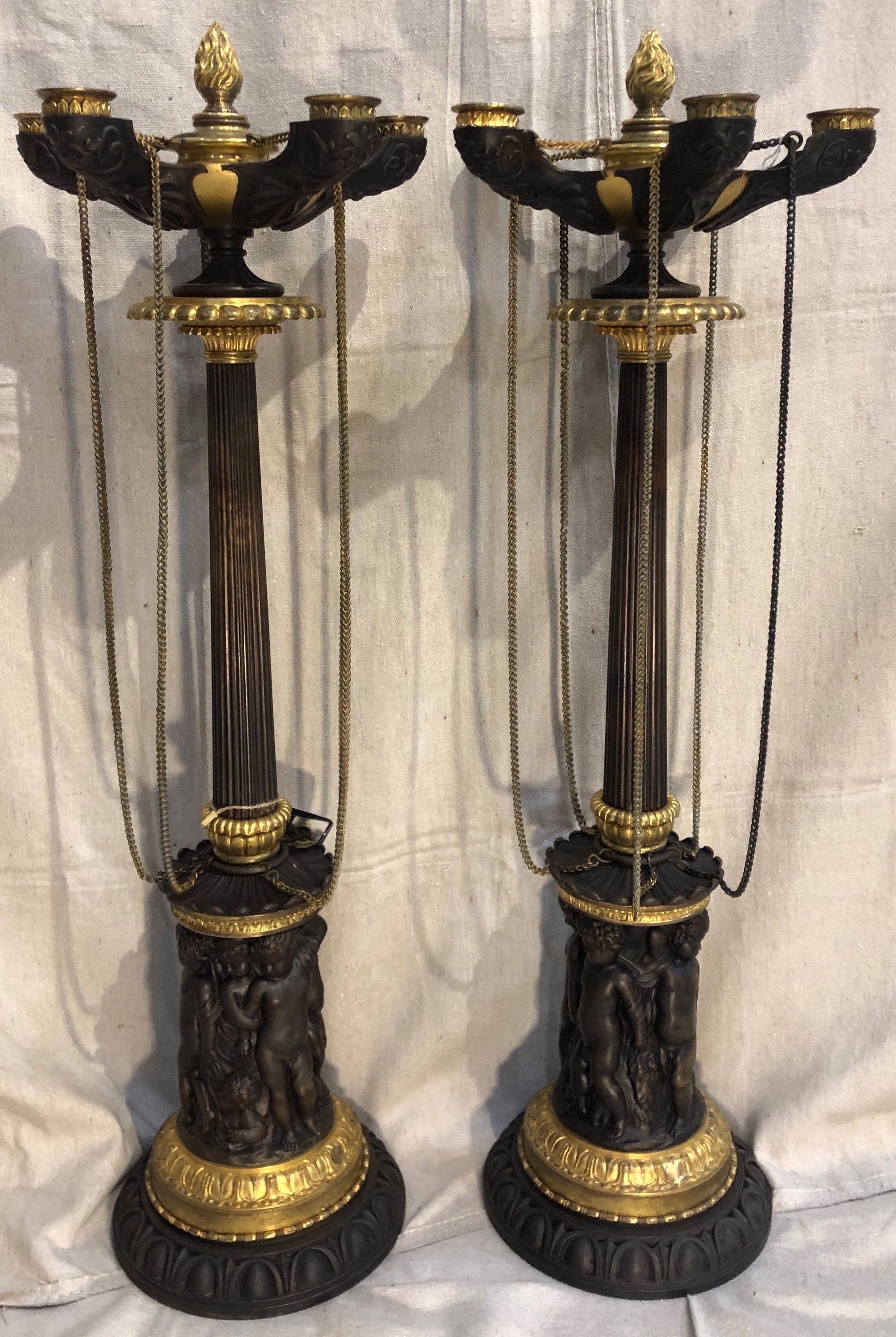 Very good pair of 19th century continental neoclassical bronze candelabras.