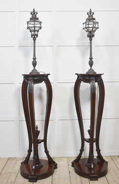 Pair of bronze newel post lamps