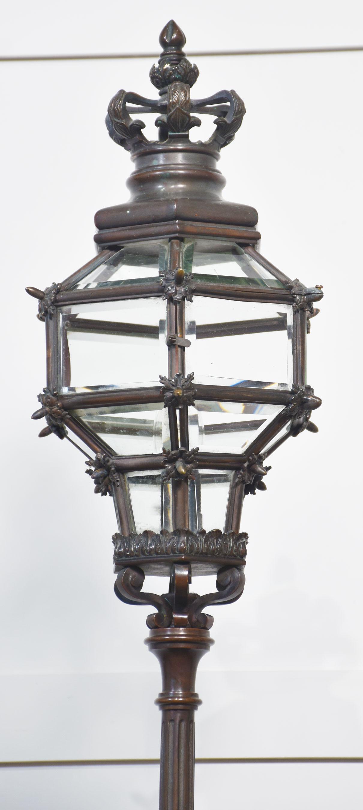Bronze Pair of bronze newel post lamps For Sale