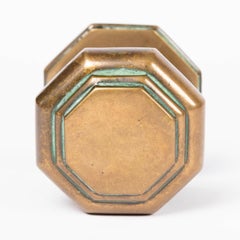 Pair of bronze octagonal door centre pulls