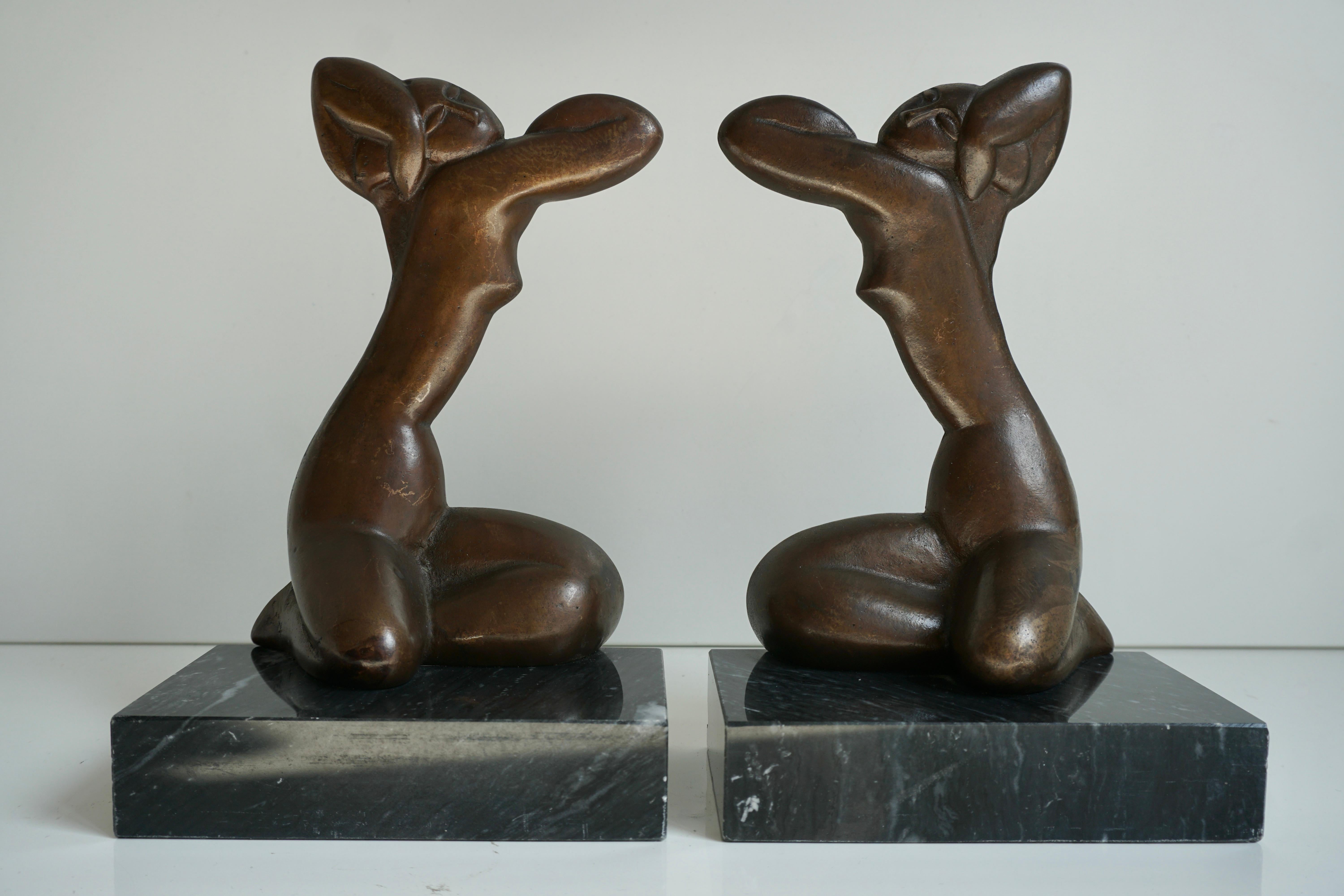 What is better than a pair of  figural female in bronze on marble bases supporting your books.