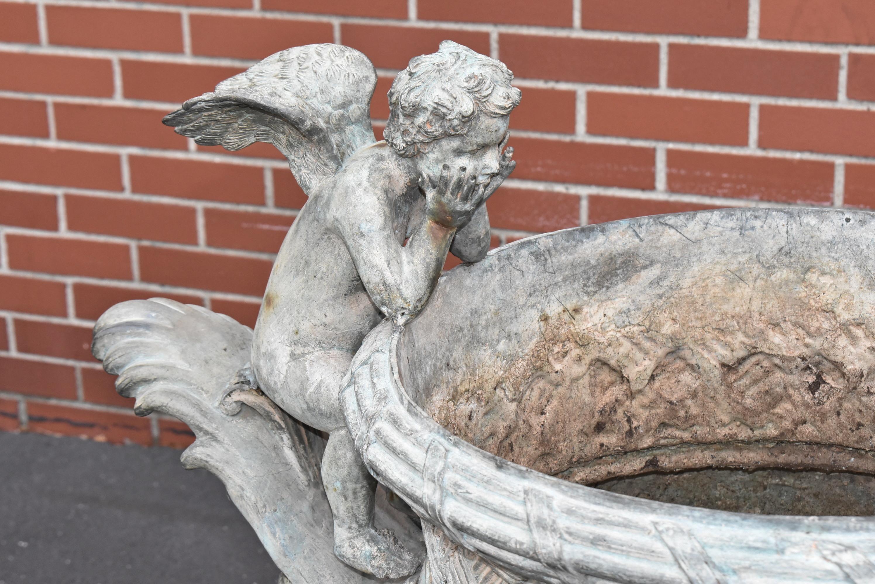 Neoclassical Pair of Bronze Outdoor Urns with Winged Cherubs
