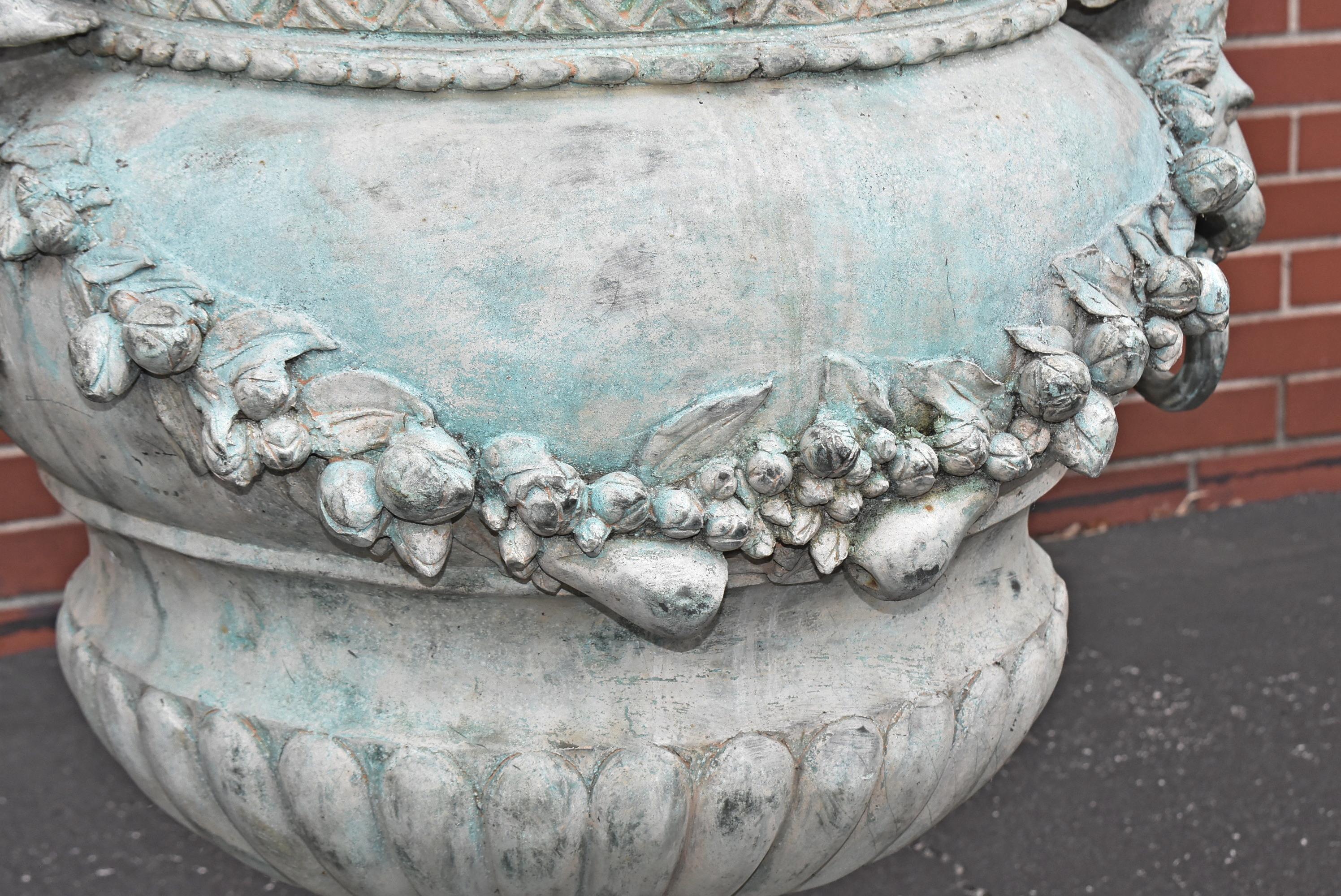 Pair of Bronze Outdoor Urns with Winged Cherubs 1