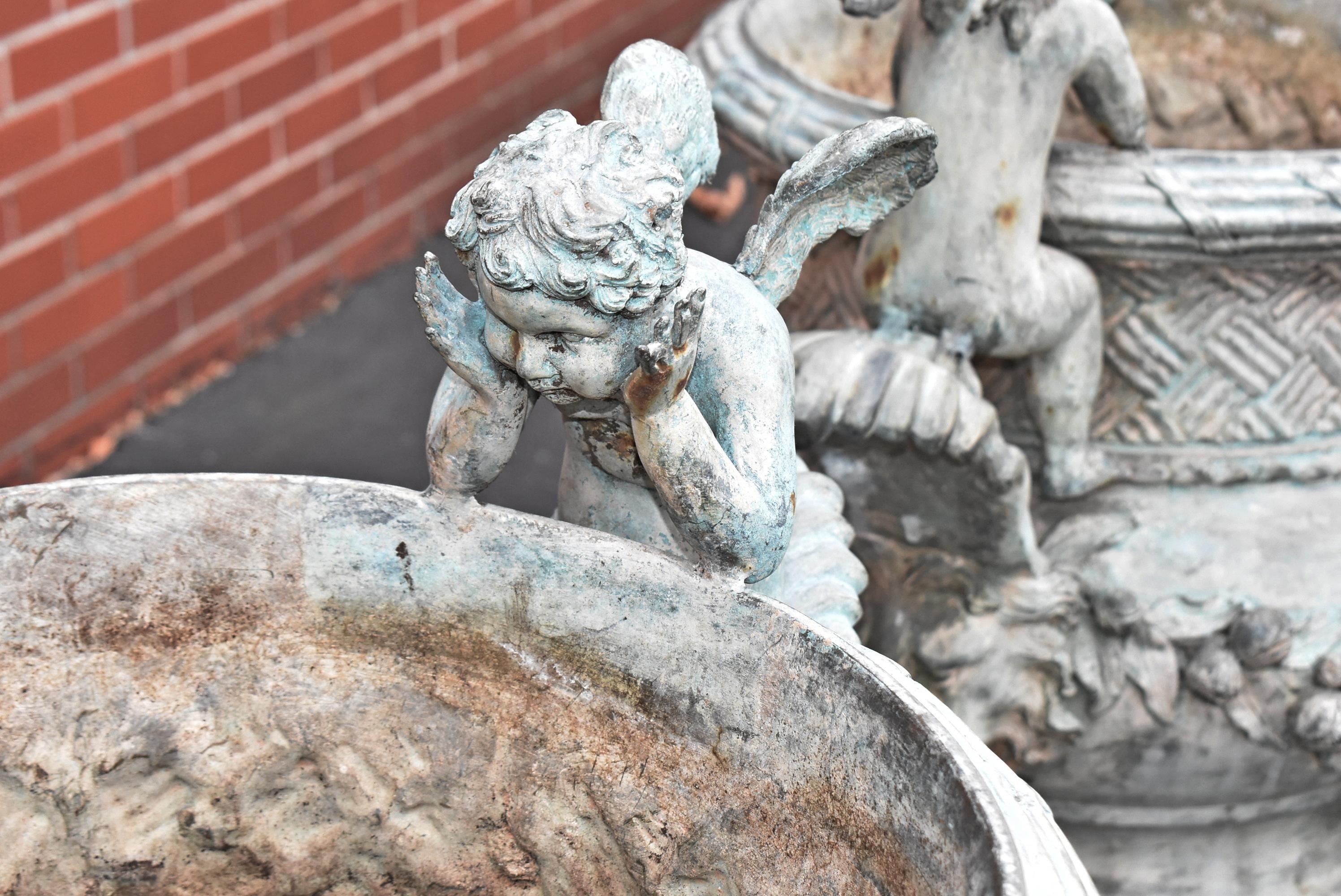Pair of Bronze Outdoor Urns with Winged Cherubs 2