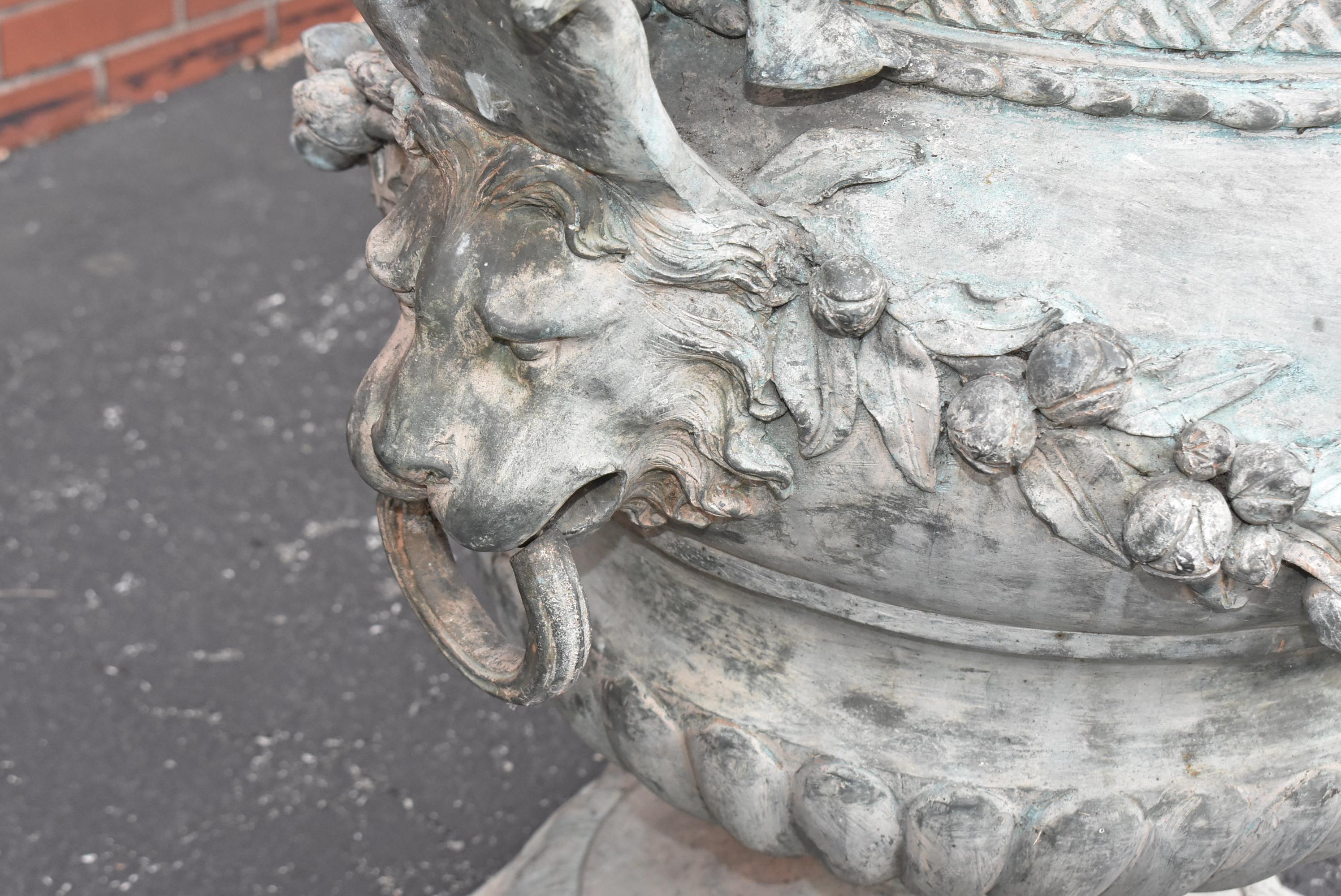 Pair of Bronze Outdoor Urns with Winged Cherubs 4