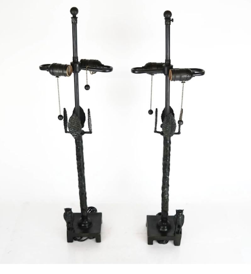 Pair of later re-cast bronze table lamps with owl figures on the bases, after Diego Giacometti (1902-1985).