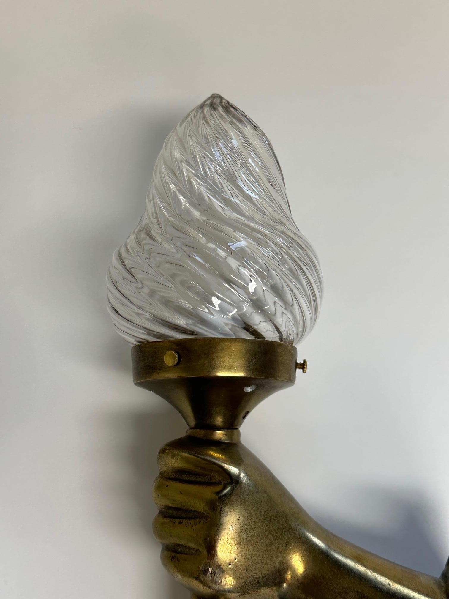 Pair of Bronze Patina Cast Metal & Blown Glass Sconces with Hands and Torches In Good Condition In Hopewell, NJ