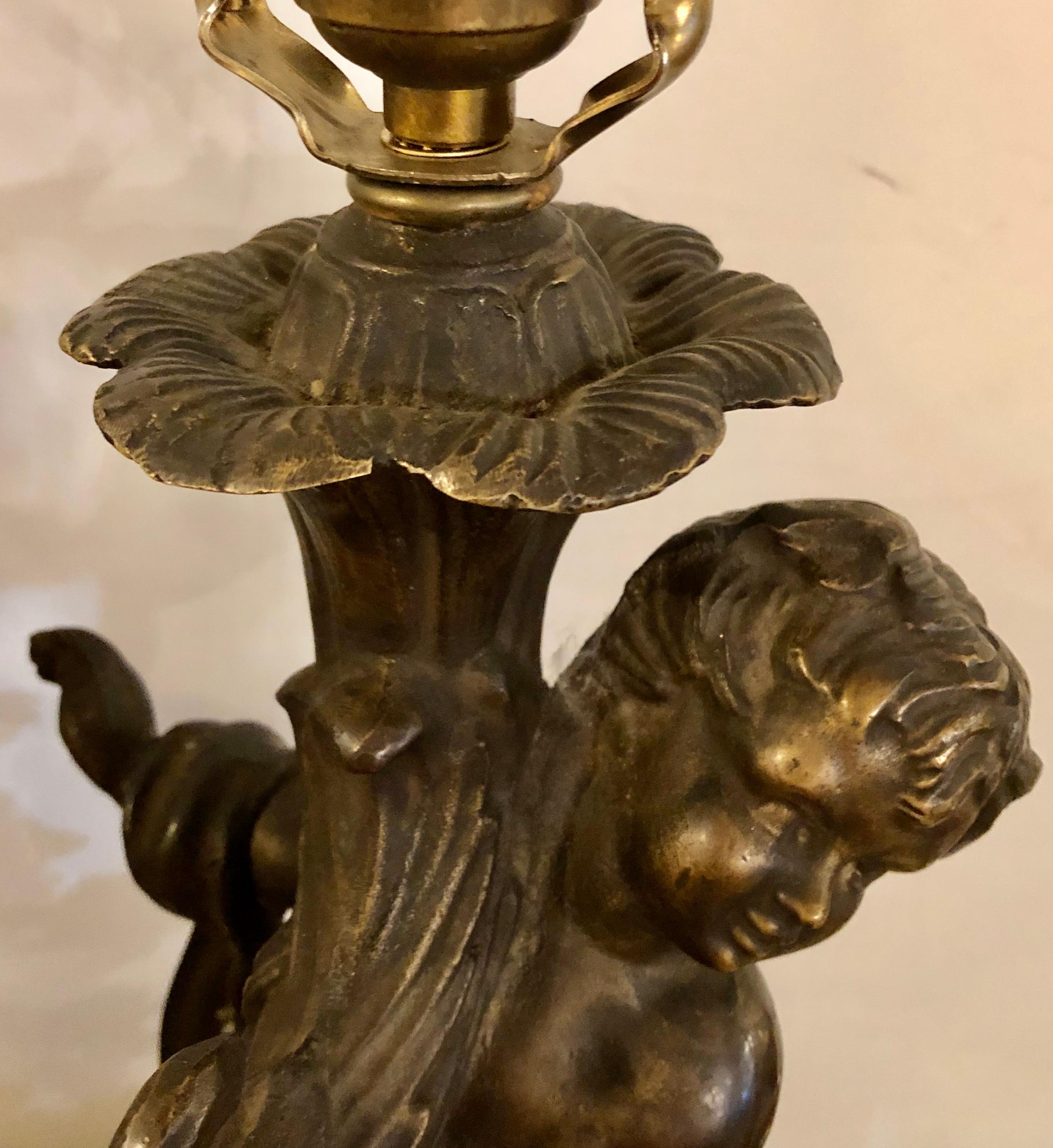 20th Century Pair of Bronze Patinated Putti Table Lamps