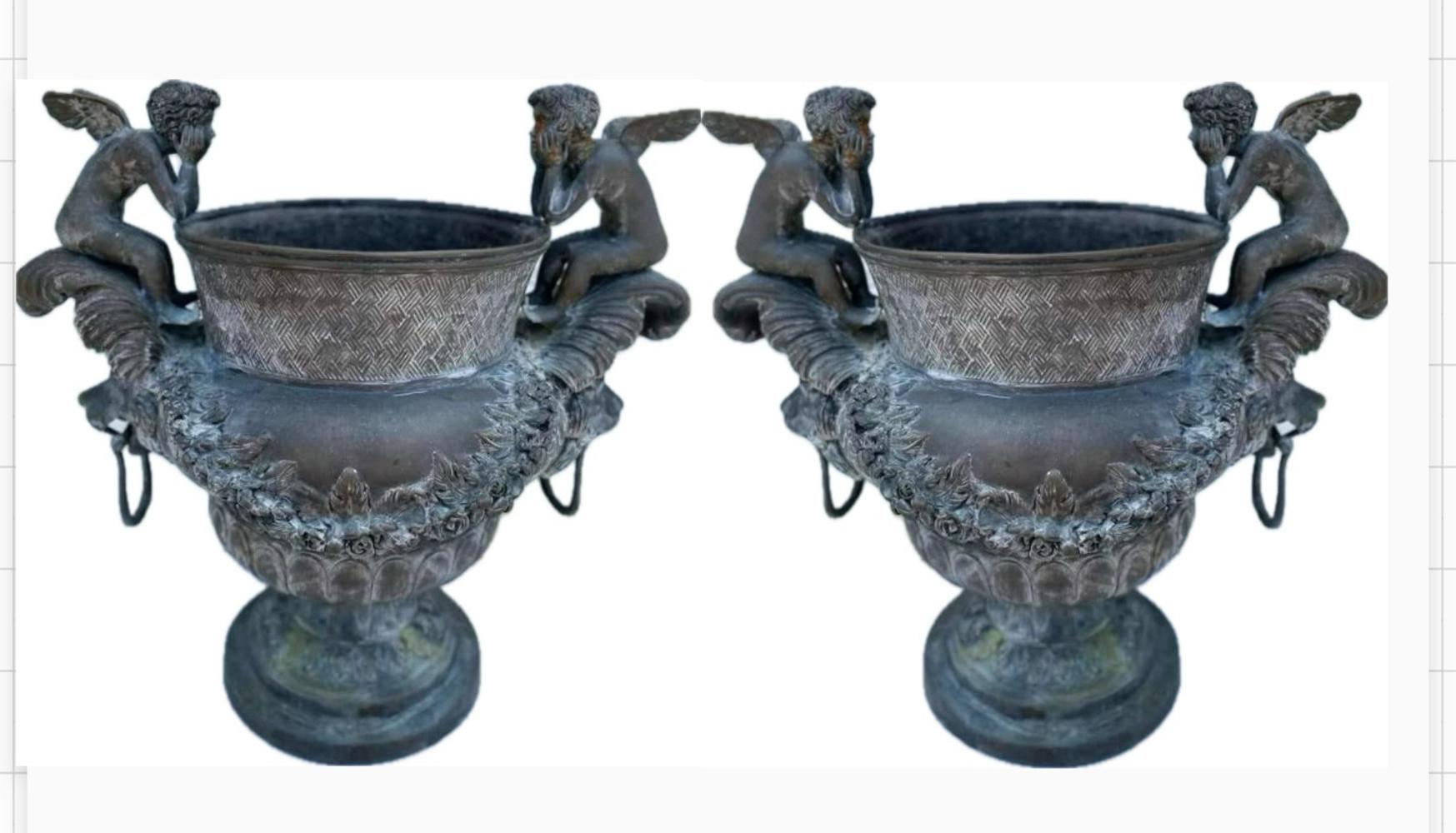 Pair of Bronze Planters with Cherubs and Lion Faces with Rings In Good Condition In Los Angeles, CA