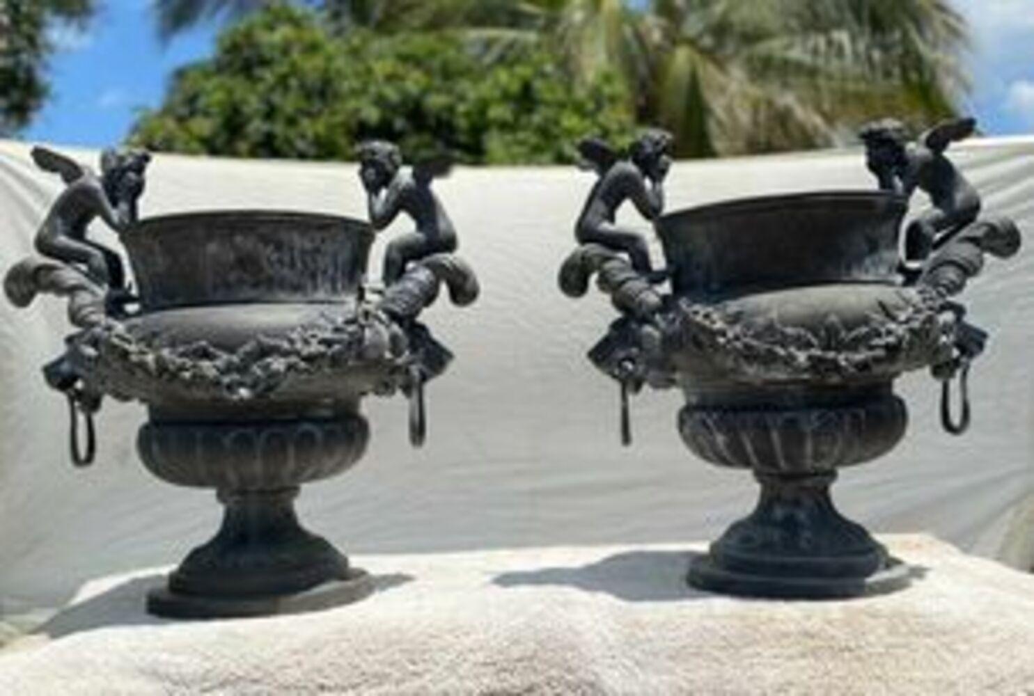 20th Century Pair of Bronze Planters with Cherubs and Lion Faces with Rings