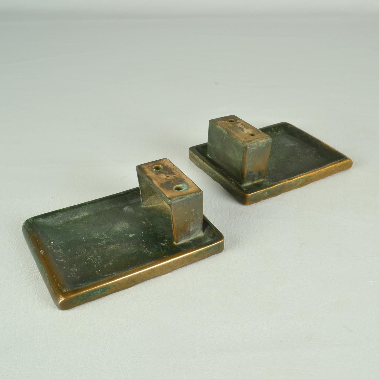 Cast Architectural Pair of Bronze Push Pull Door Handles with a Abstract Relief For Sale