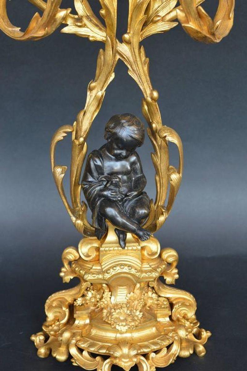 French Pair of Bronze Putti Candelabras For Sale